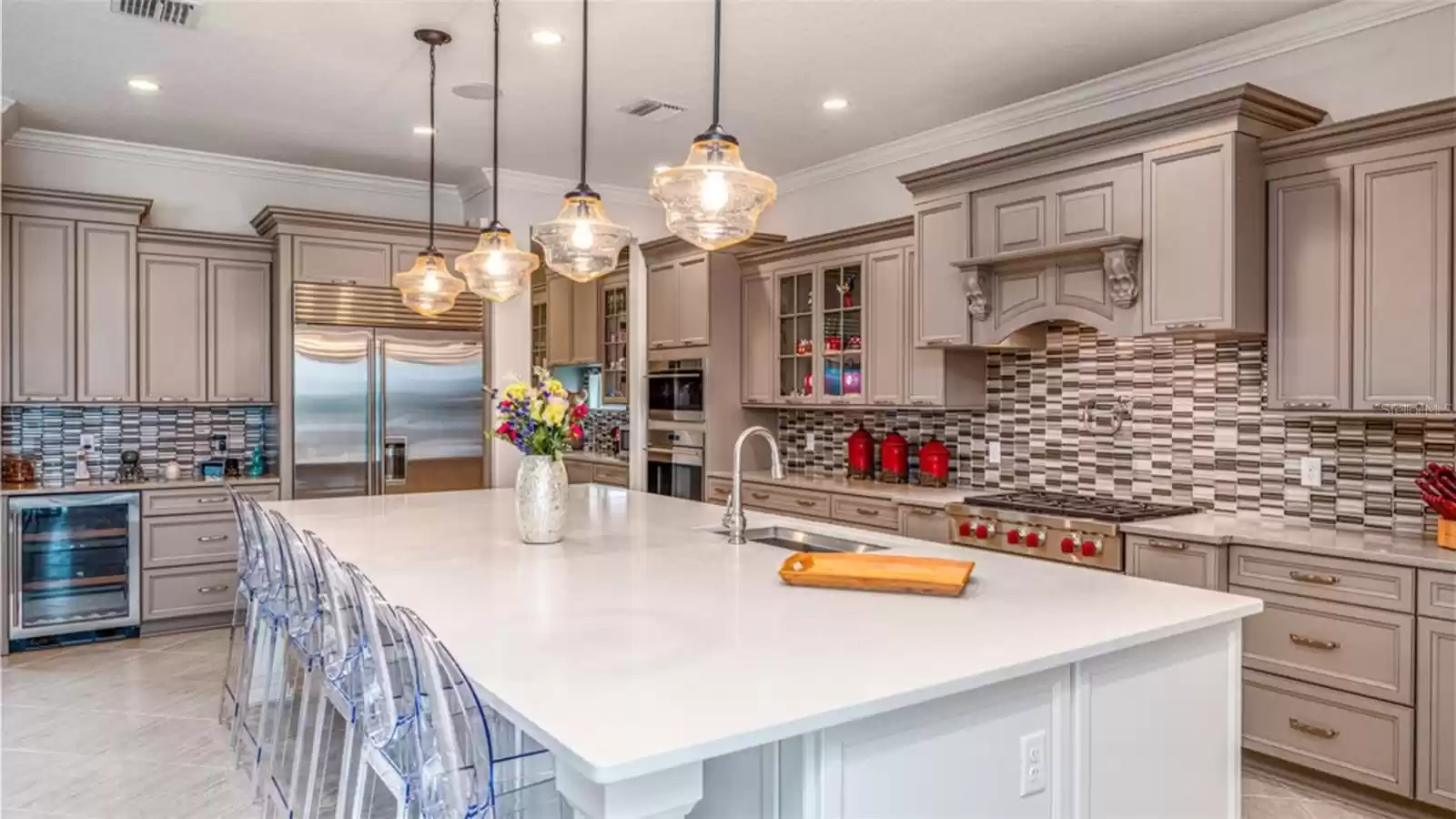 A gourmet kitchen often includes a range with a pot-filling faucet