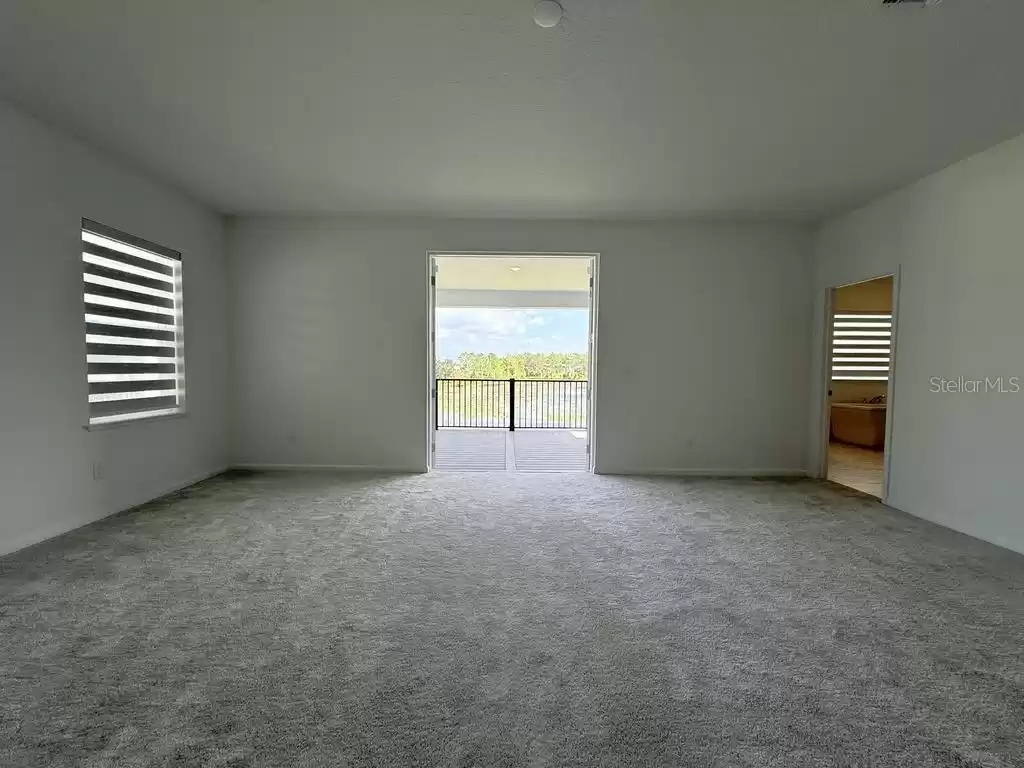 Master Bedroom With Large Opening To The Balcony