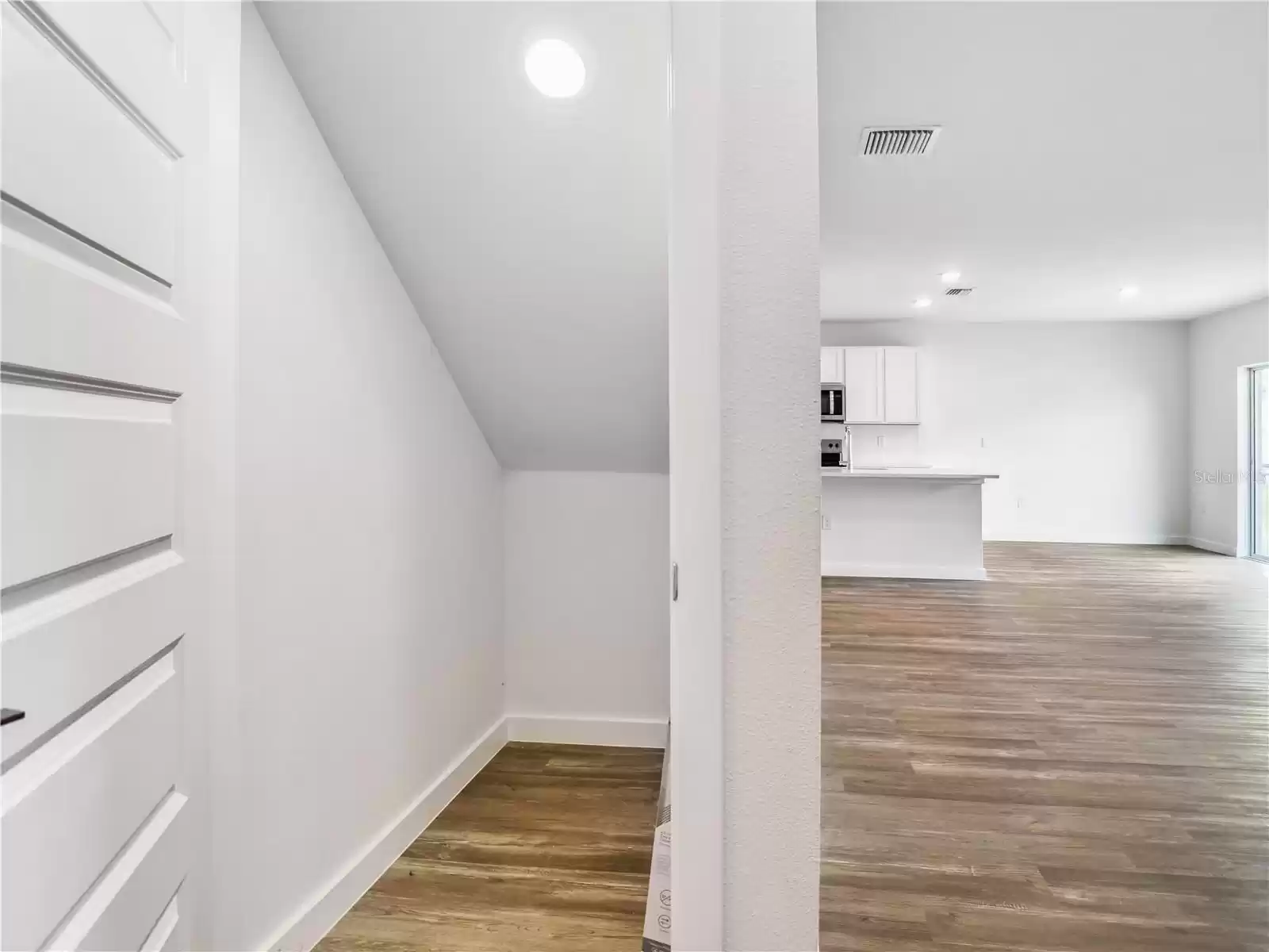 Storage behind staircase