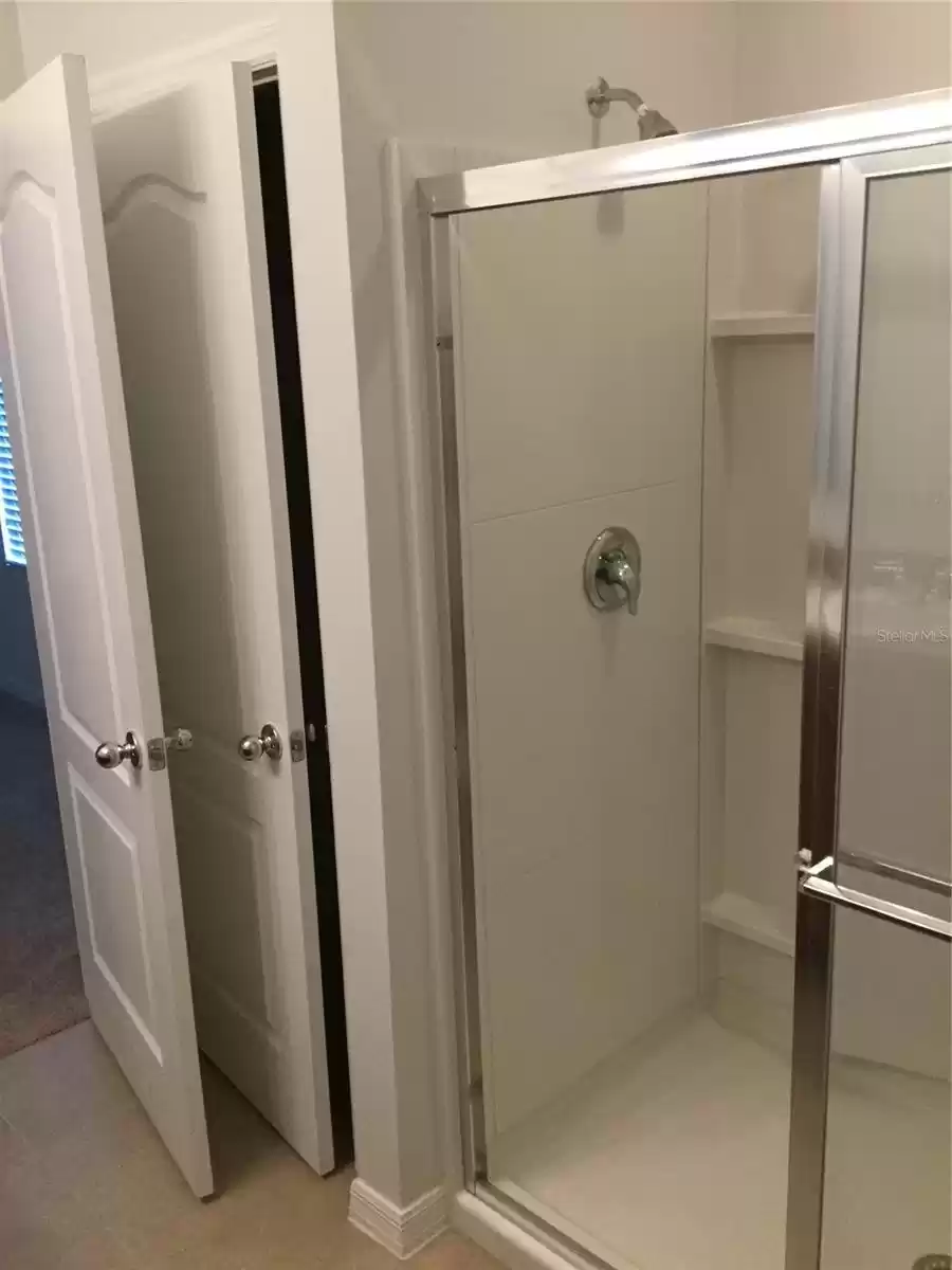 Master linen closet & shower