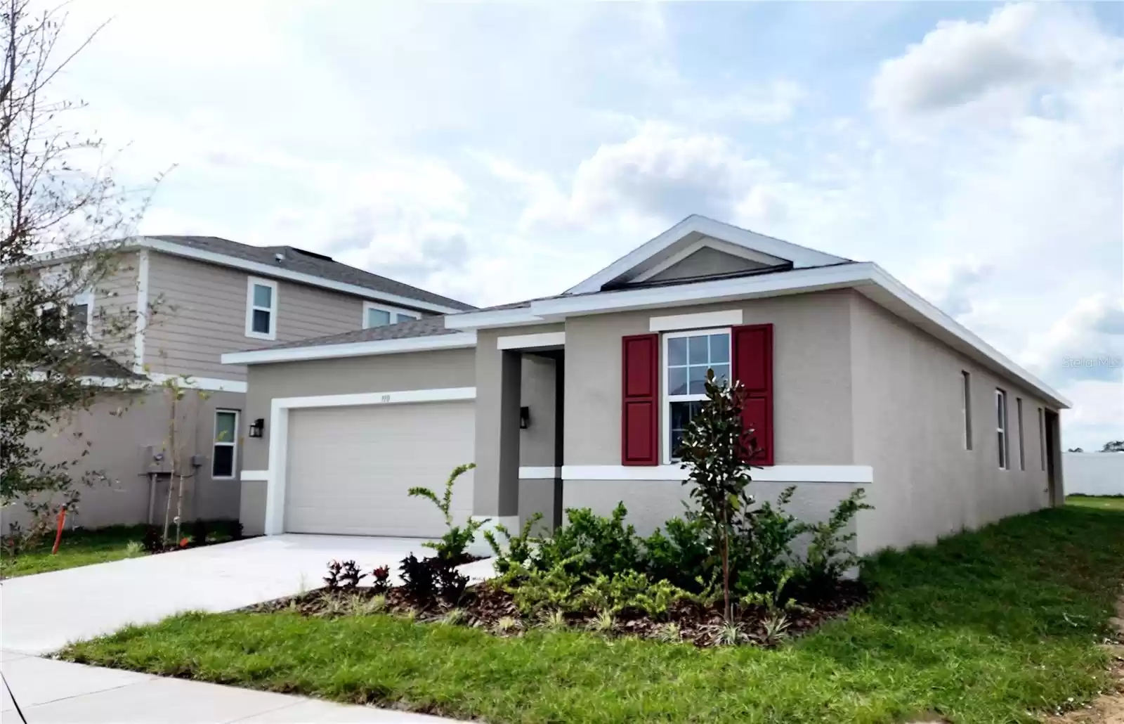 . The inviting covered entry opens into a spacious living room and a stunning kitchen