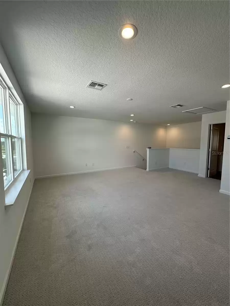 Studio and bathroom over the garage