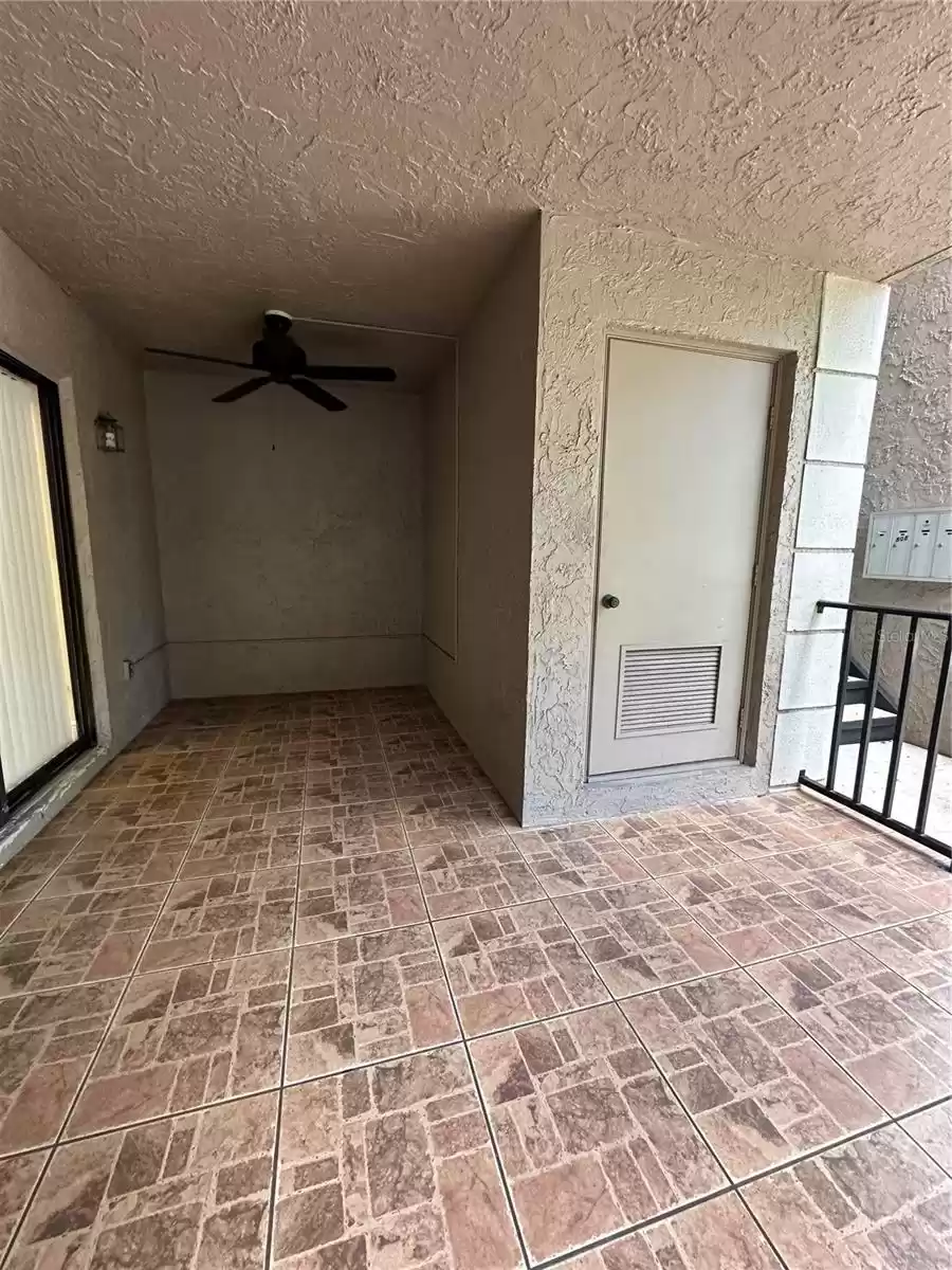 FRONT PORCH w/STORAGE ROOM