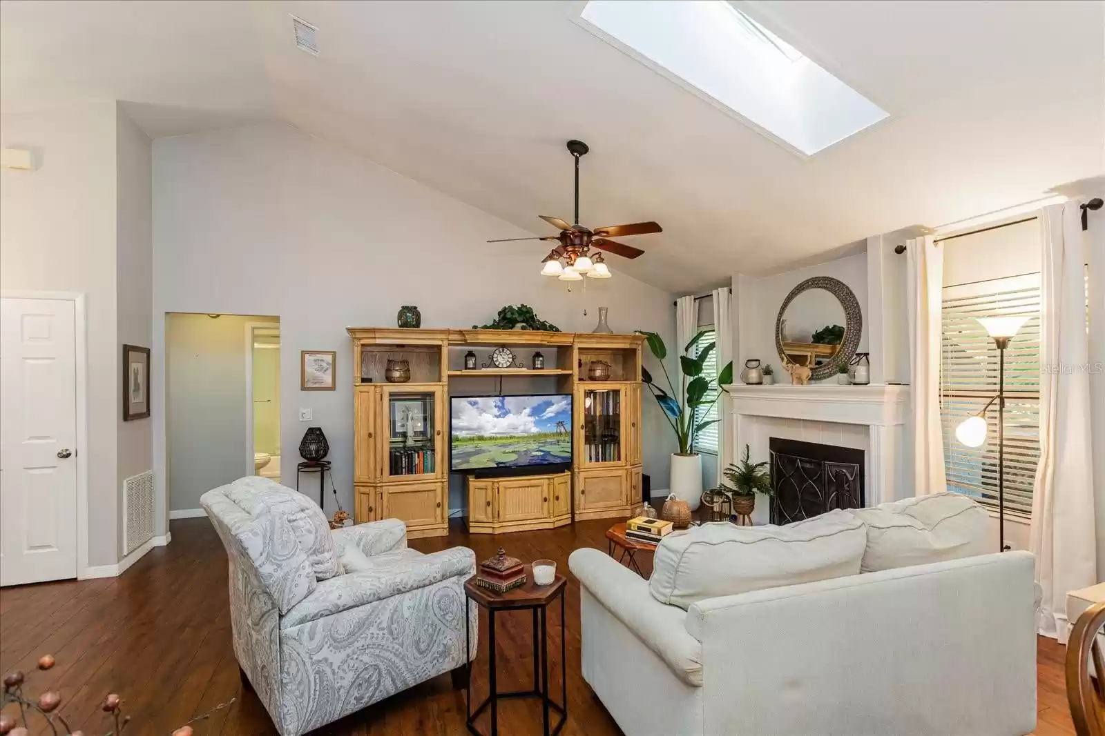 Light & Bright Living Room with Vaulted Ceiling