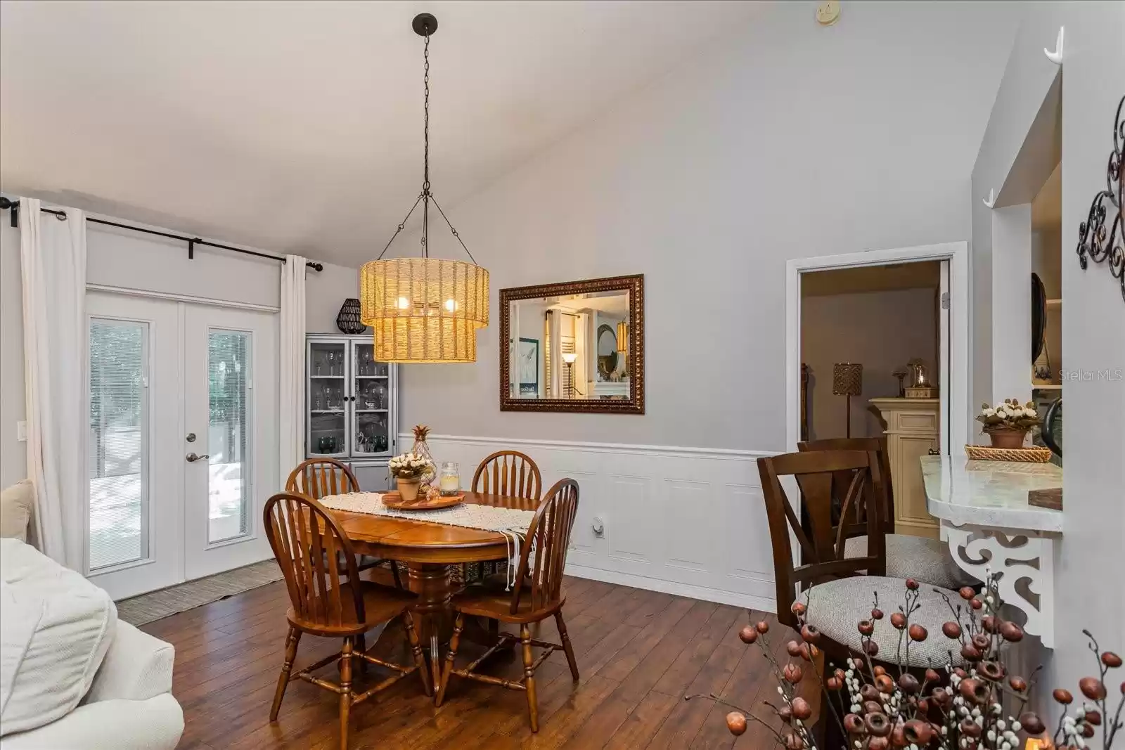 Dining Room features French Doors to the pool.