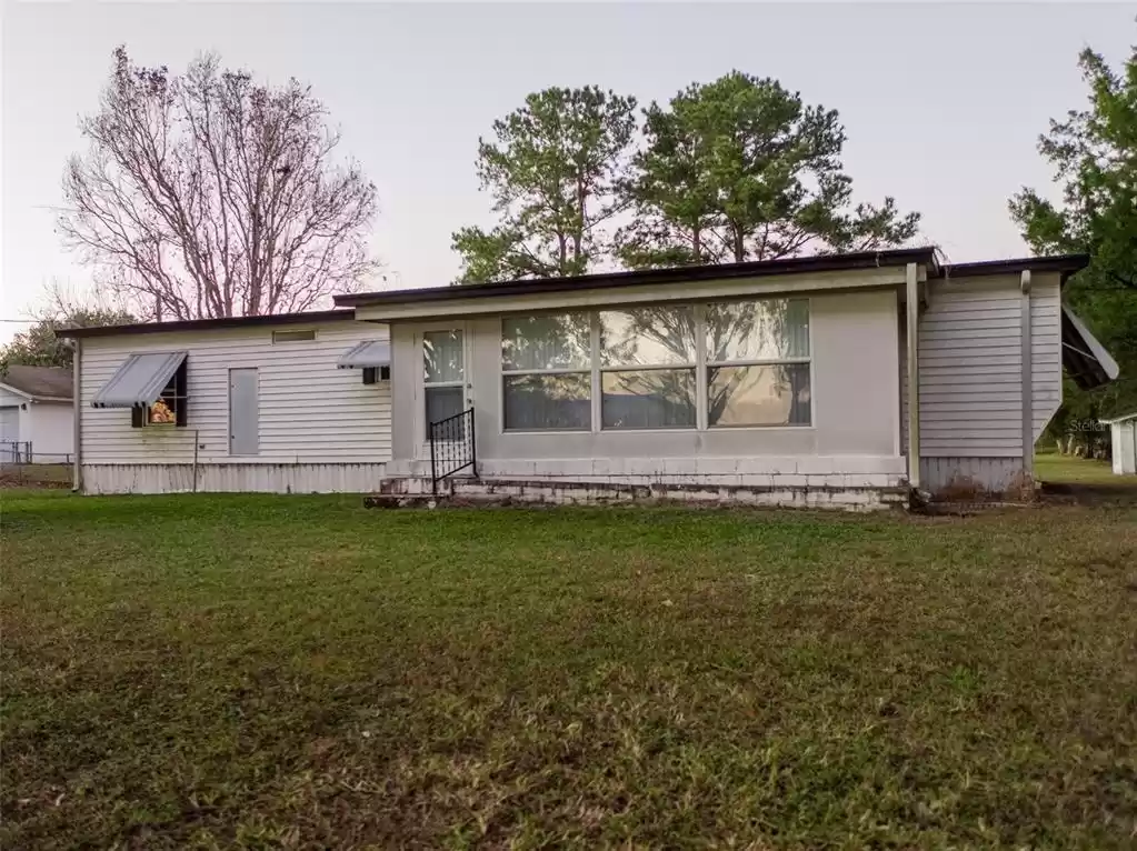 2/2 with large Florida room porch on front and huge enclosed porch on back that adds to living space