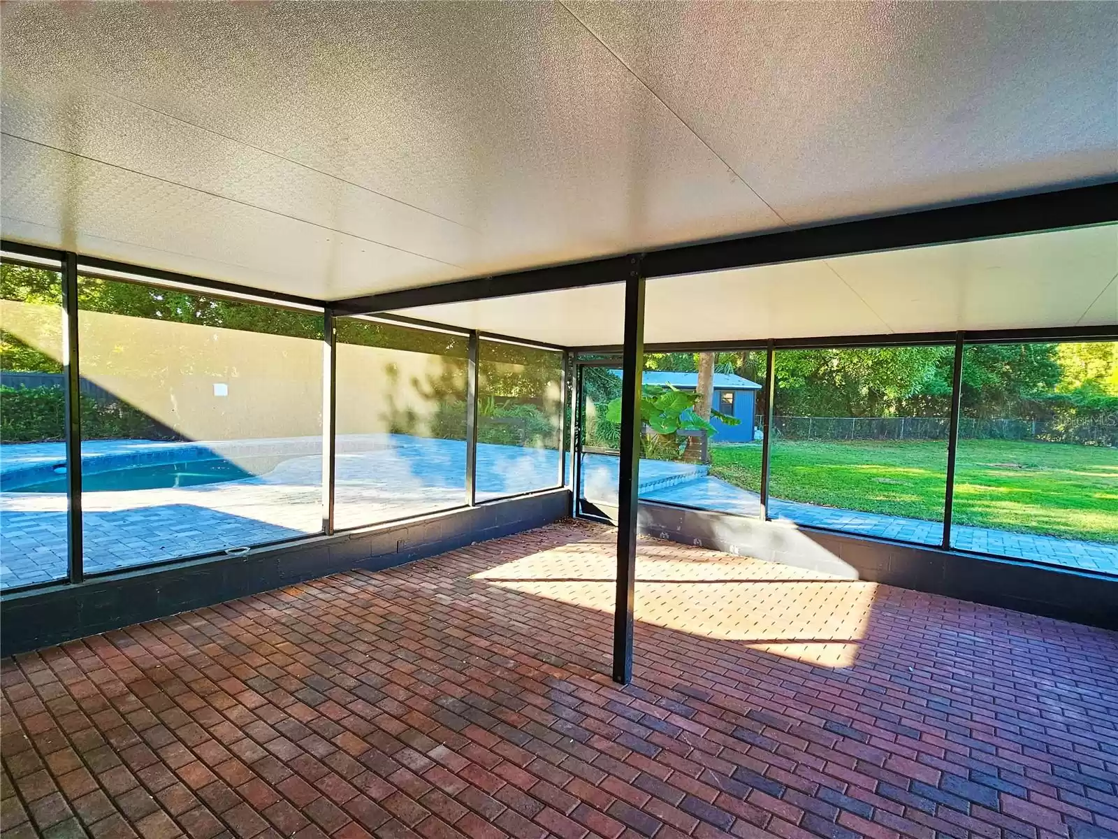 Expansive screen enclosed patio