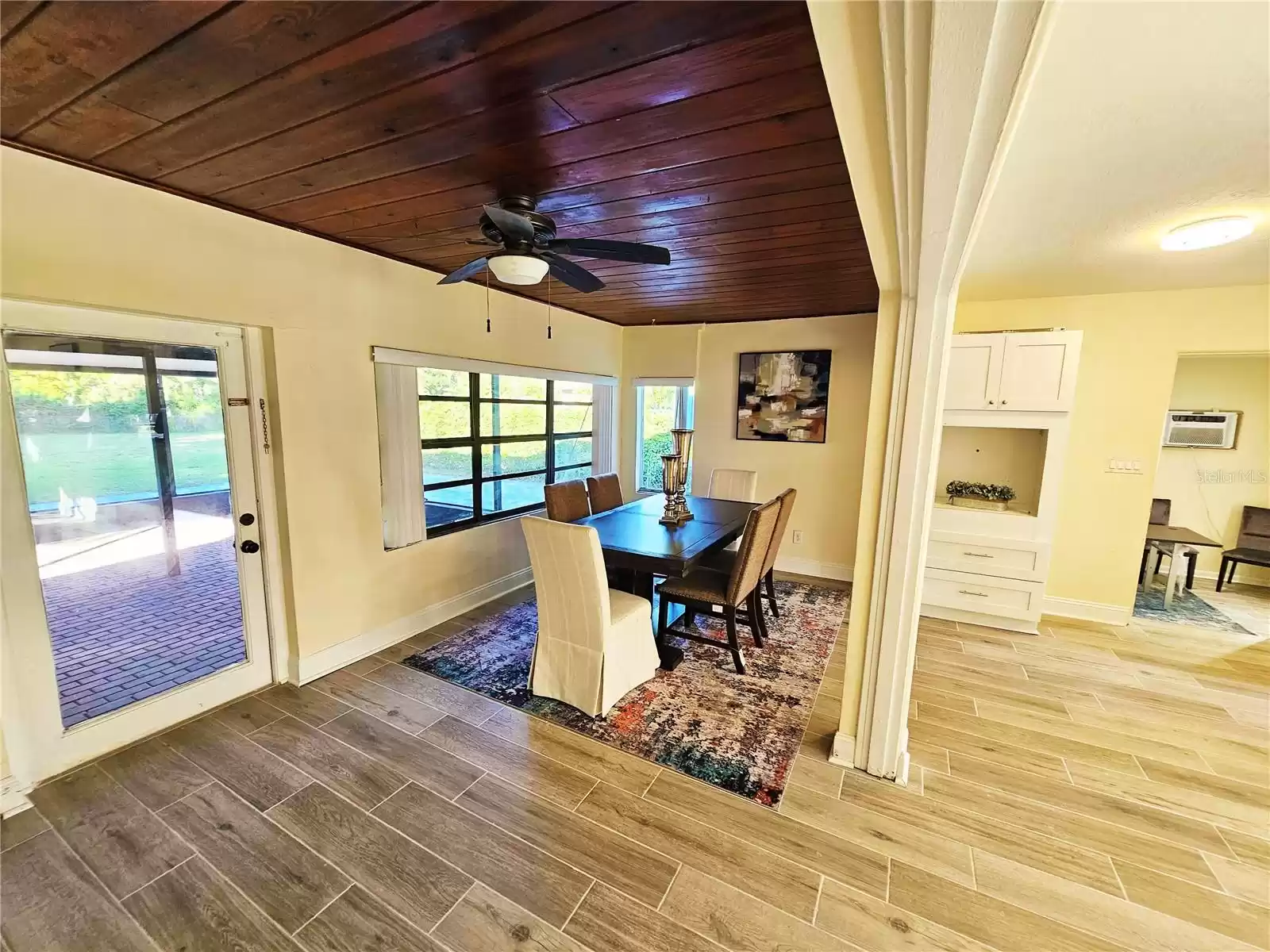 Dining Room with a view of the screen enclosed patio