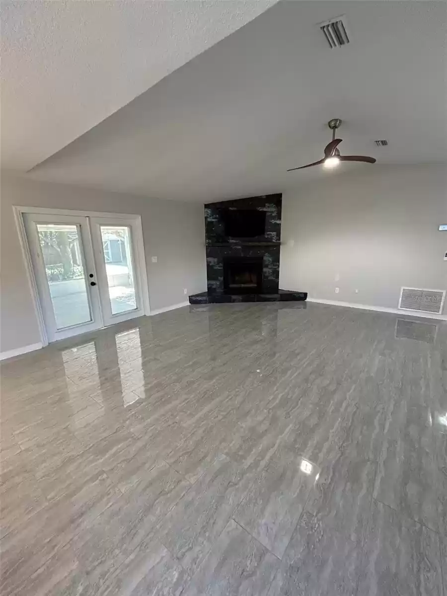 Living/Great Room with French doors to screen porch