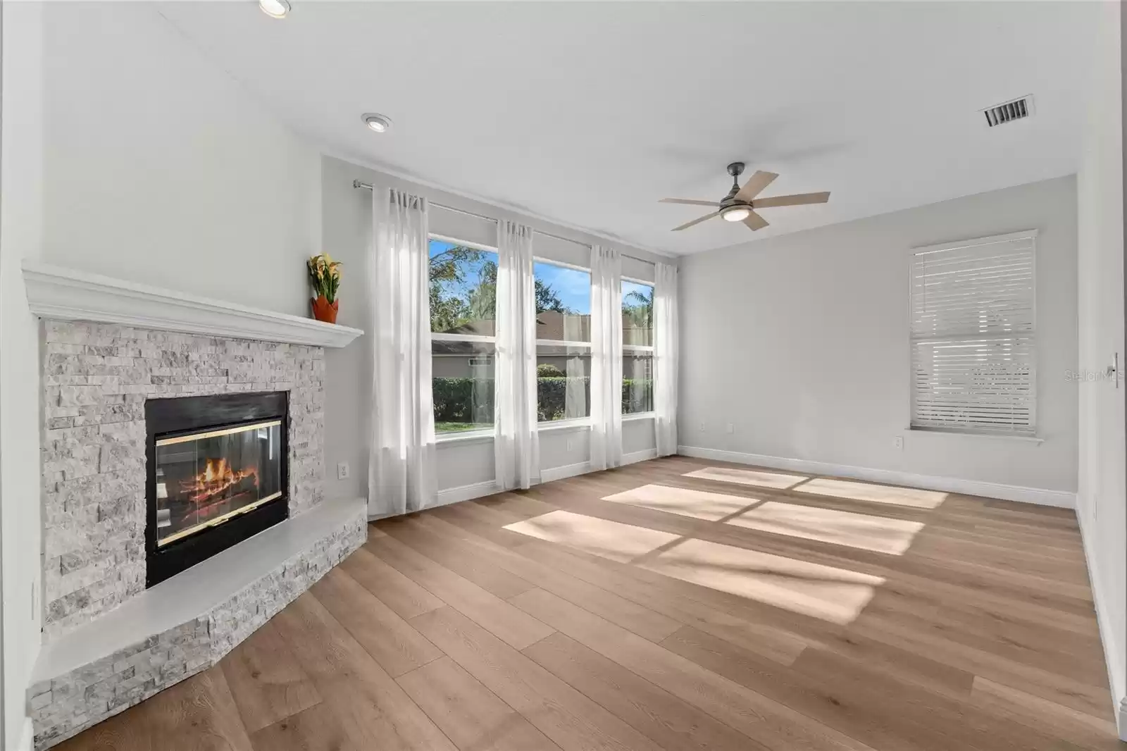 Wood fireplace in Family room