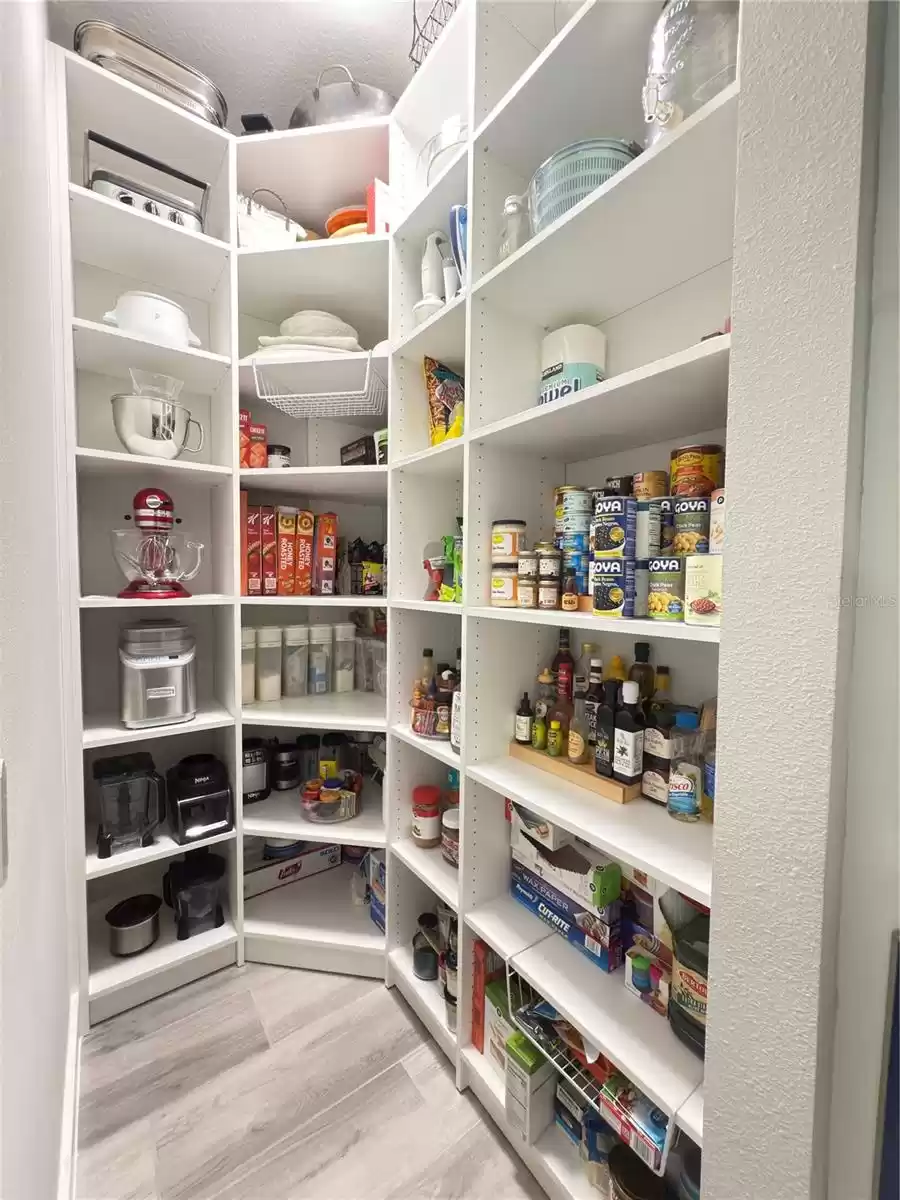 pantry - custom shelving added by owner