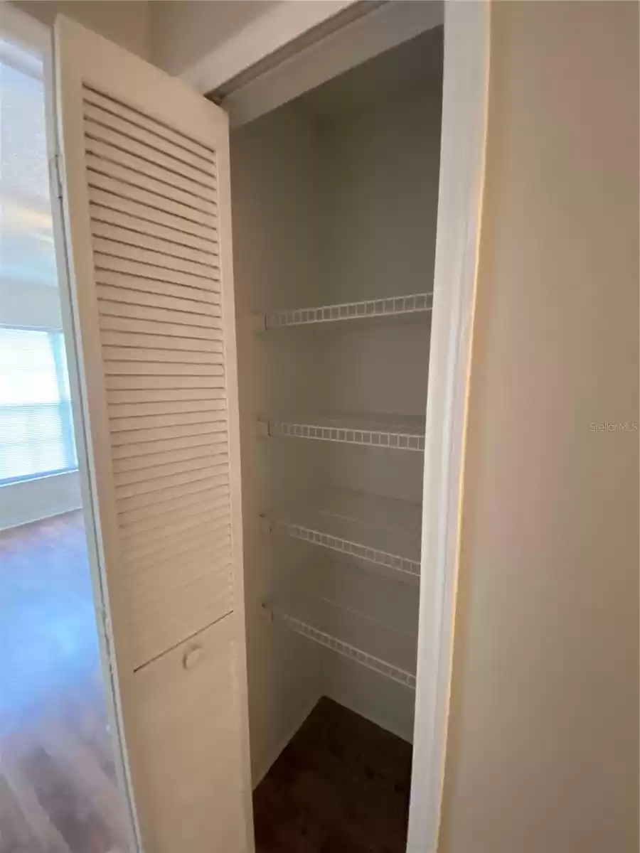 Interior of Hallway Linen Closet