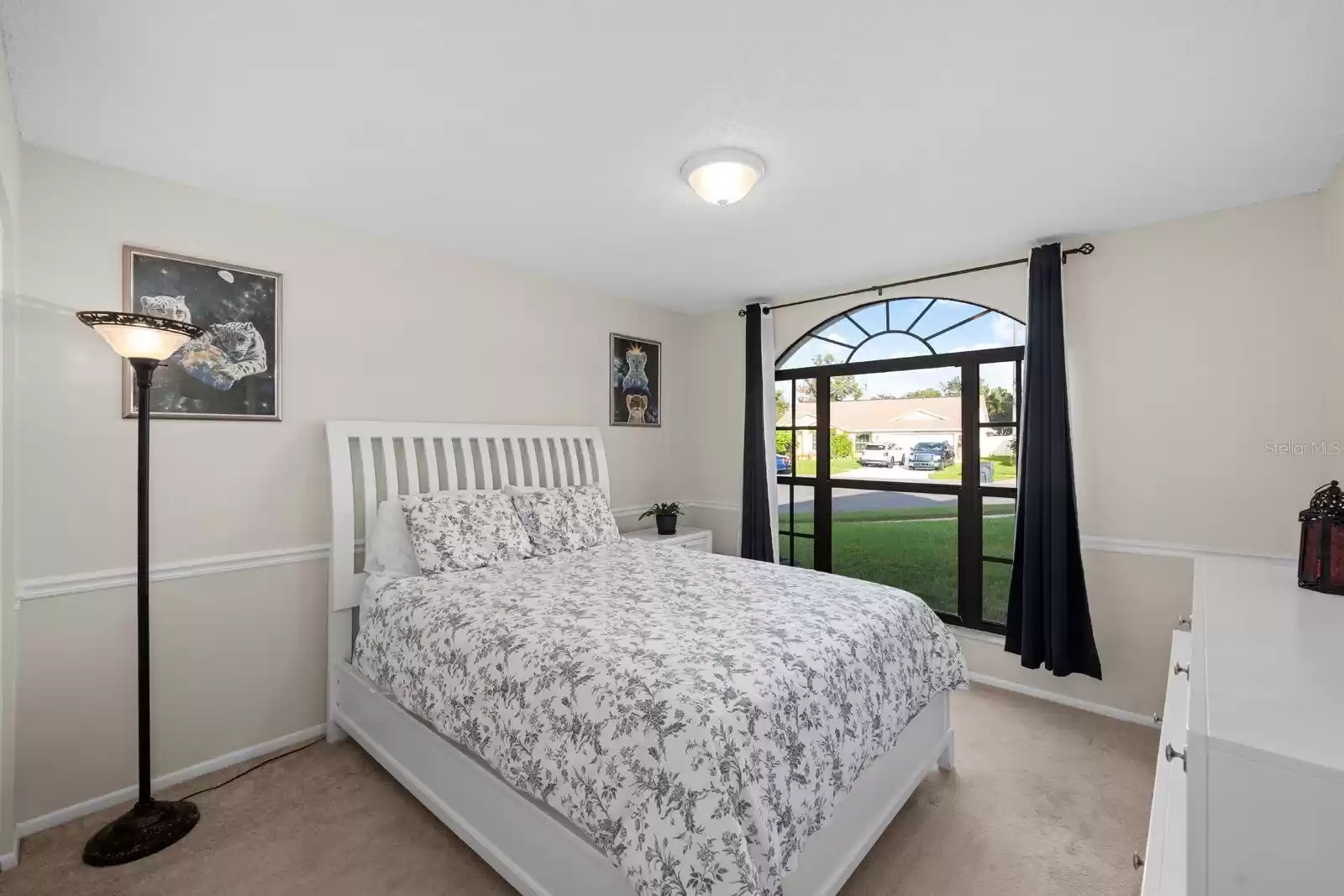 bedroom 2 with view of the front yard