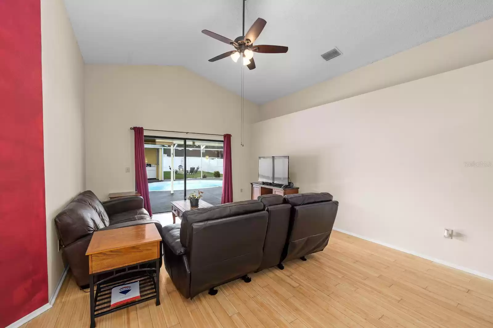 family room with pool view