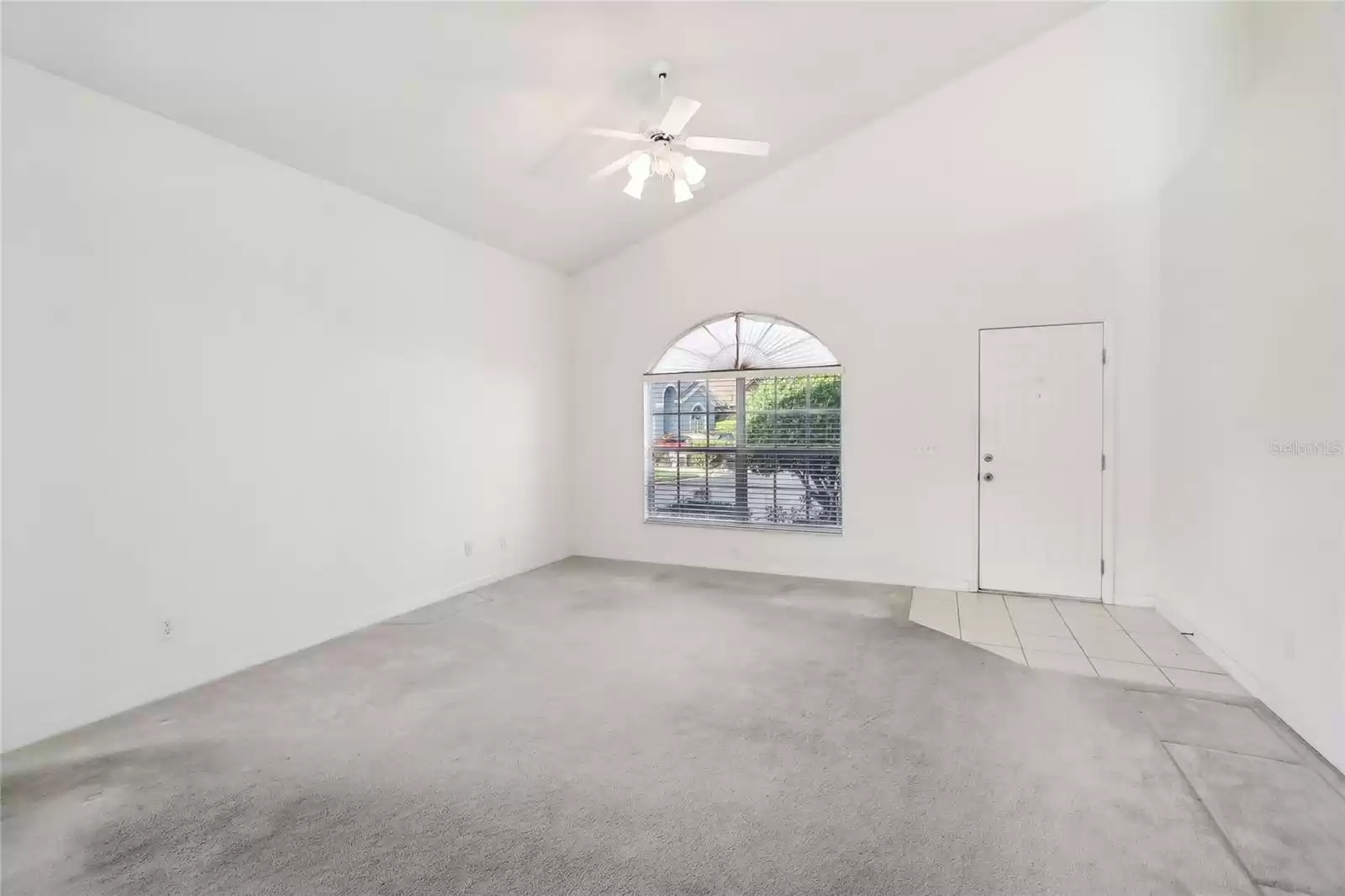 Living room/dining room combo at the front of the home.