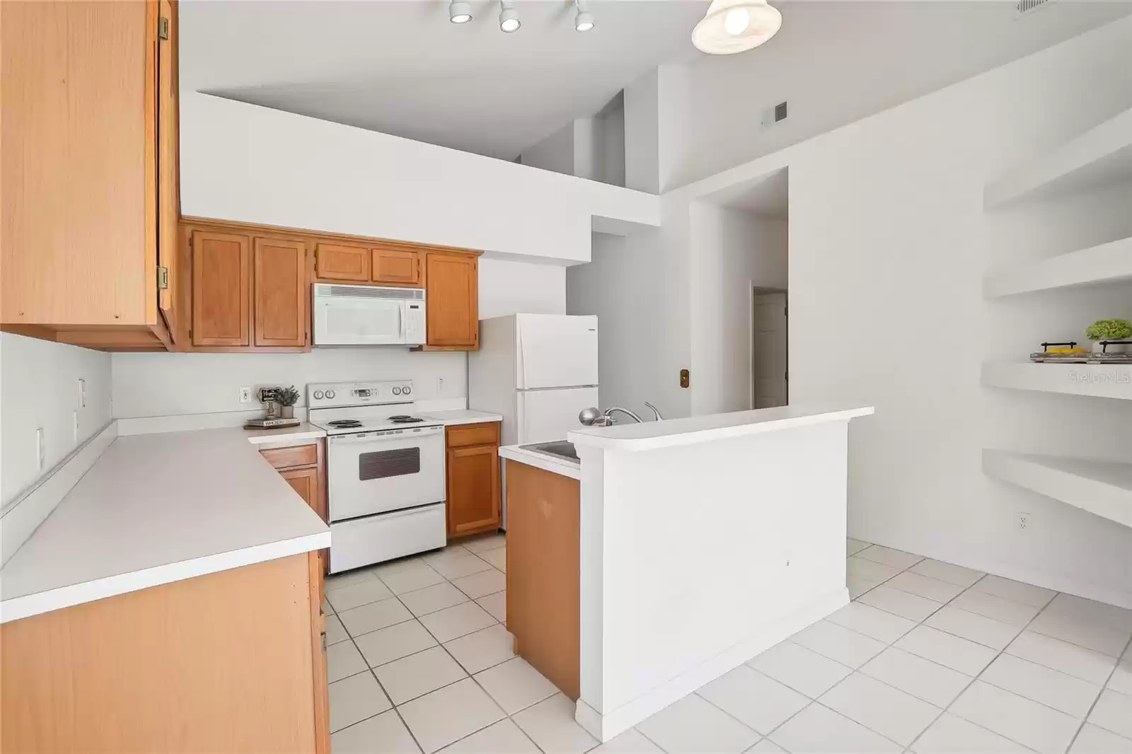 It wouldn't take much to refresh this functional kitchen