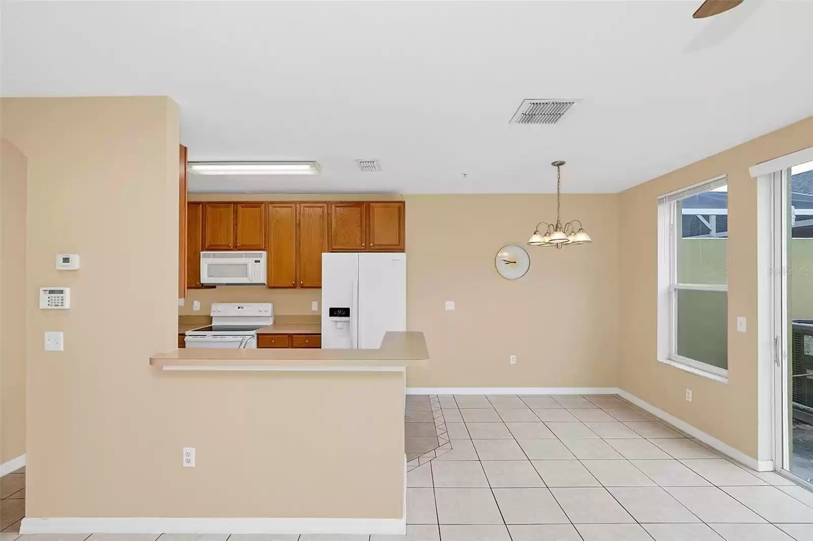 6347 WESTCOTT COVE BOULEVARD, ORLANDO, Florida 32829, 3 Bedrooms Bedrooms, ,2 BathroomsBathrooms,Residential,For Sale,WESTCOTT COVE,MFRO6259193