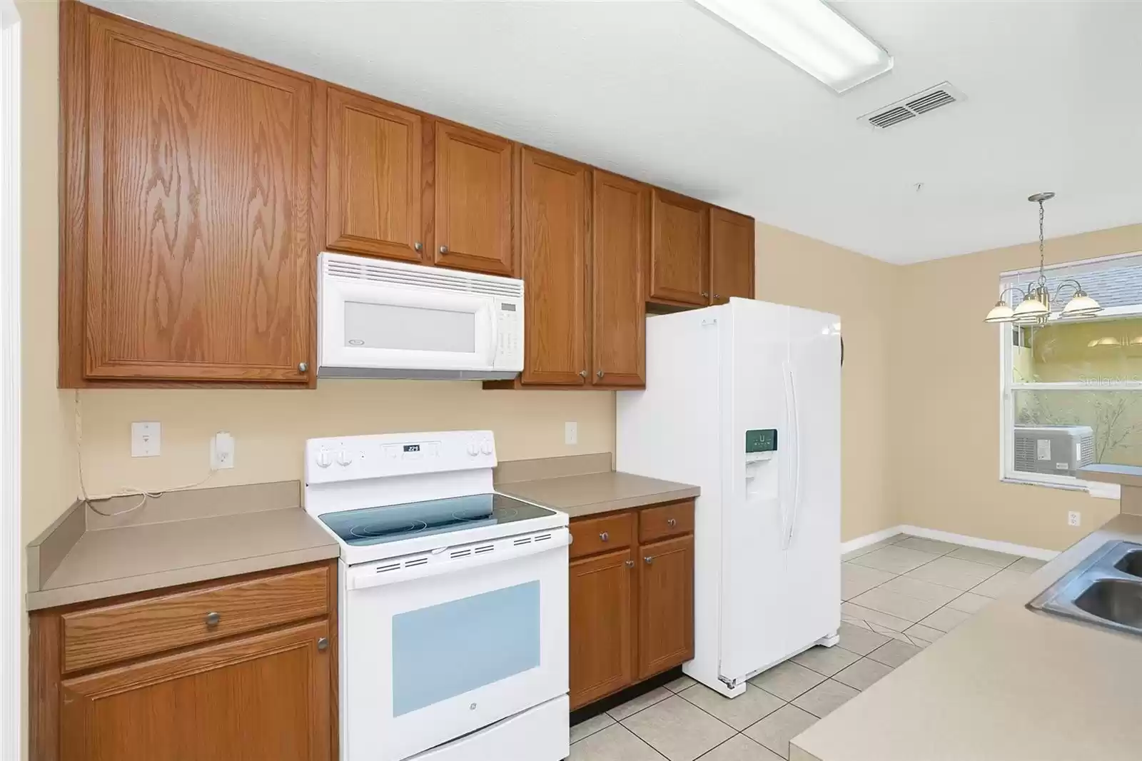 6347 WESTCOTT COVE BOULEVARD, ORLANDO, Florida 32829, 3 Bedrooms Bedrooms, ,2 BathroomsBathrooms,Residential,For Sale,WESTCOTT COVE,MFRO6259193