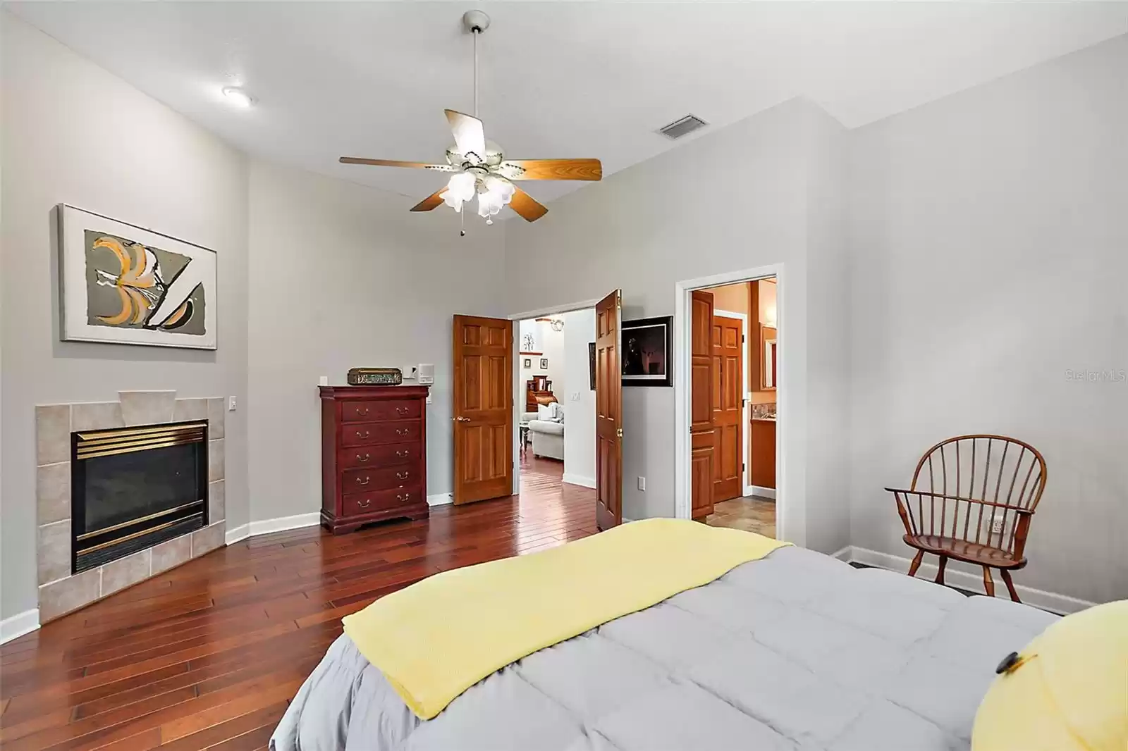 View from the owner's suite office into the bedroom and bathroom. The double doors take you back to the living room.