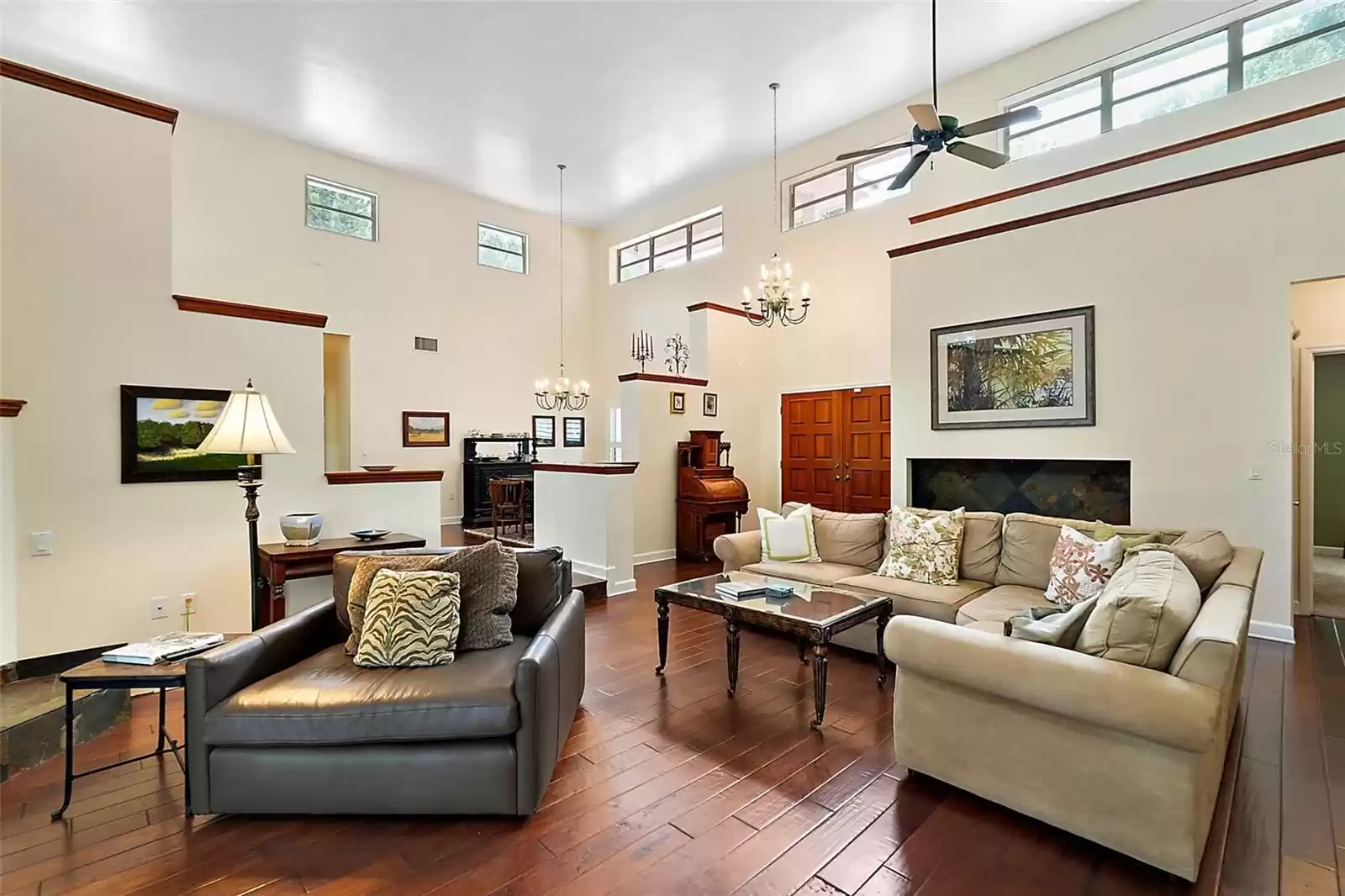 This view looks back toward the foyer and double front door. The formal dining room sits just behind the 