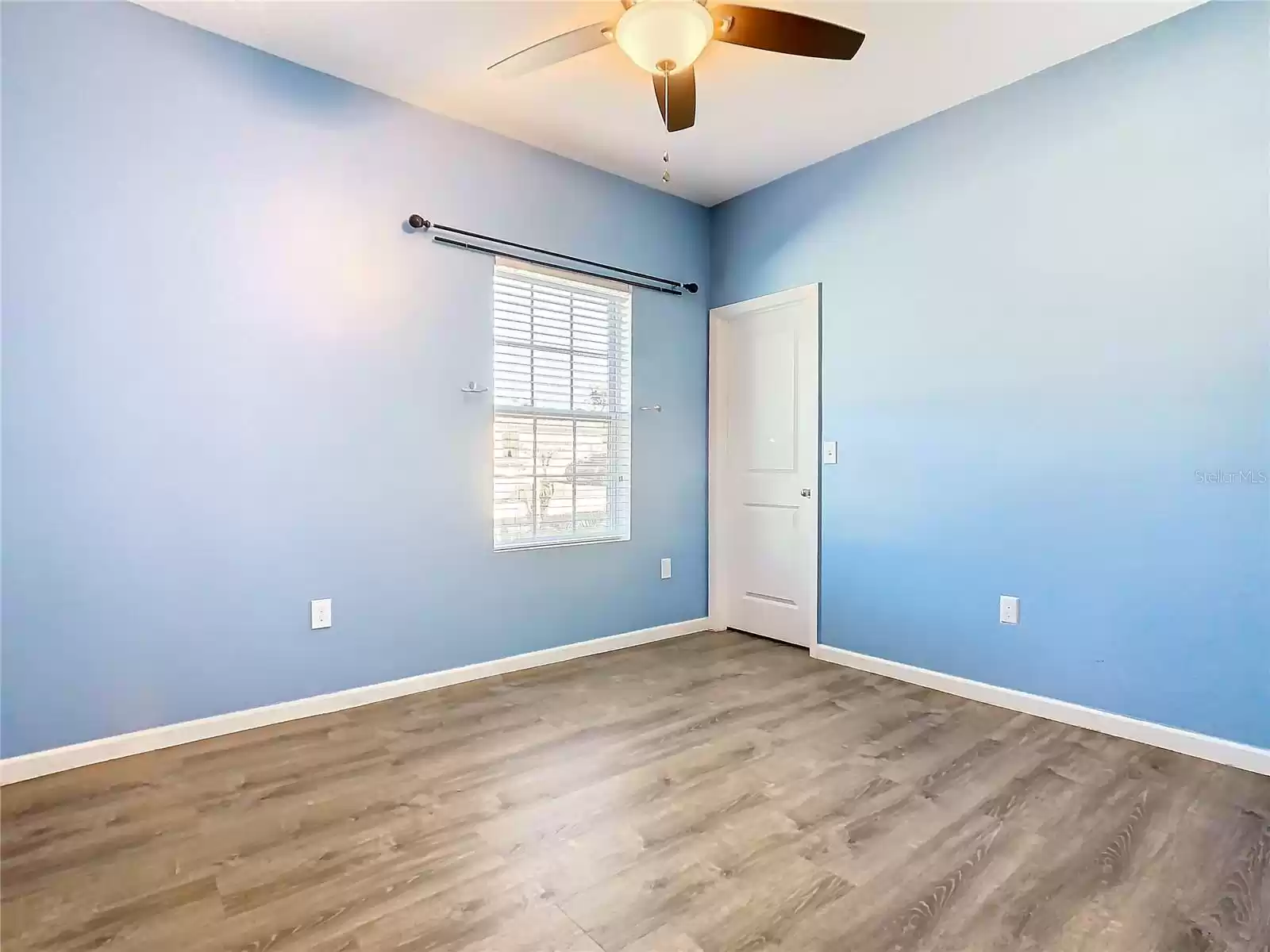 Bedroom #2 is at the front of the home and has a walk-in closet.