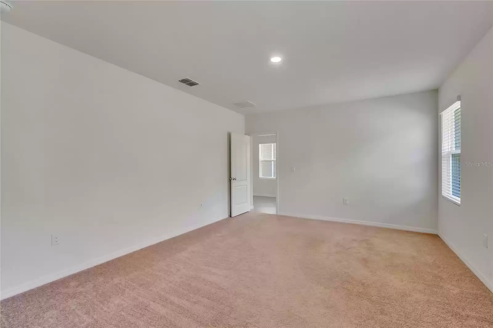 Primary Bedroom with view to the great Room