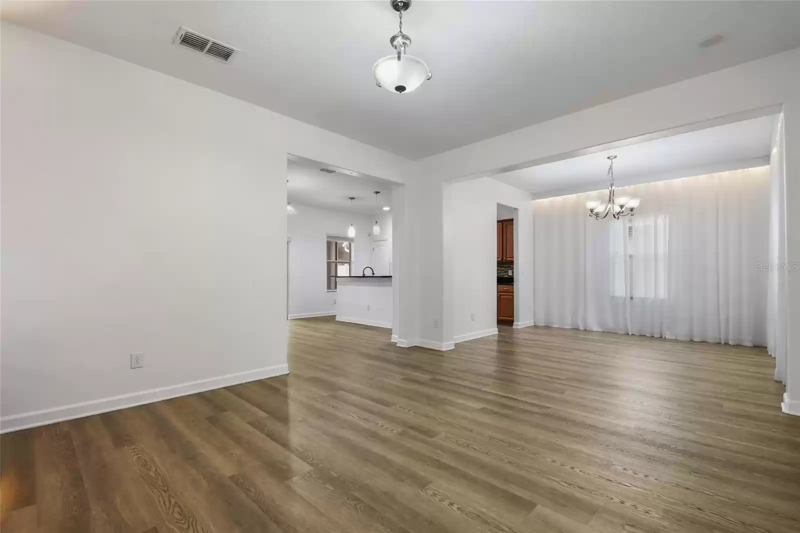 Enjoy the beautiful luxury flooring that is everywhere! No carpet at all in this home.