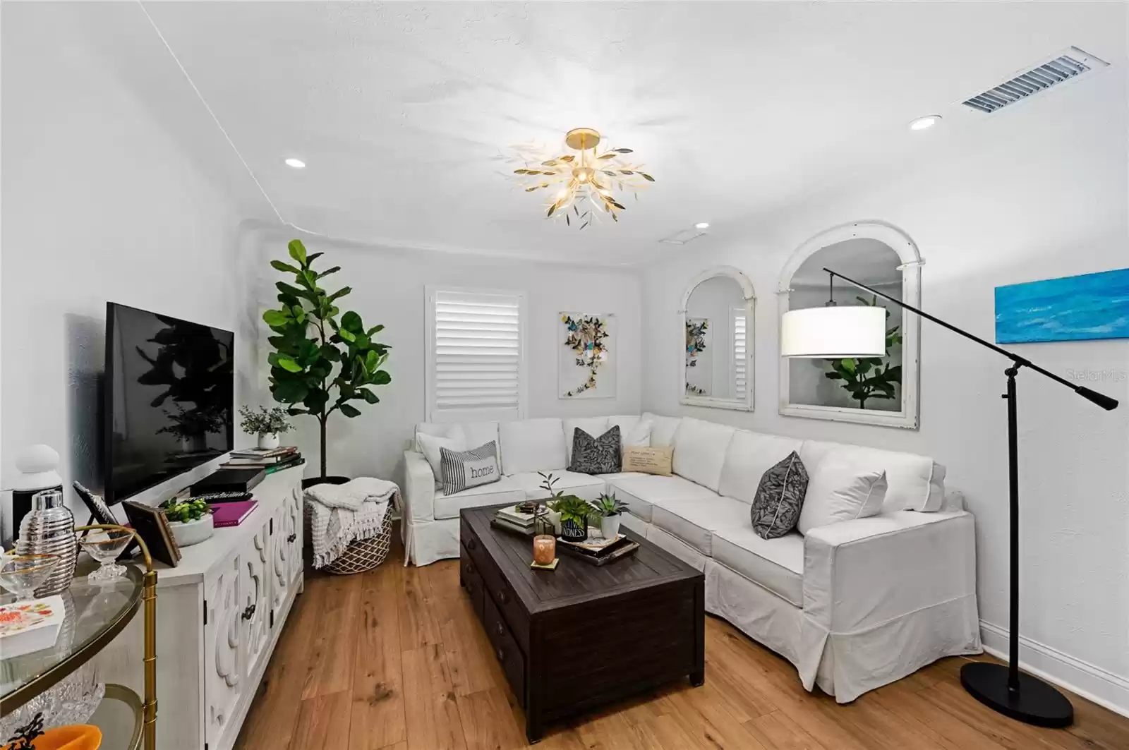 Living room with recessed lighting, ceiling fixture does not convey.