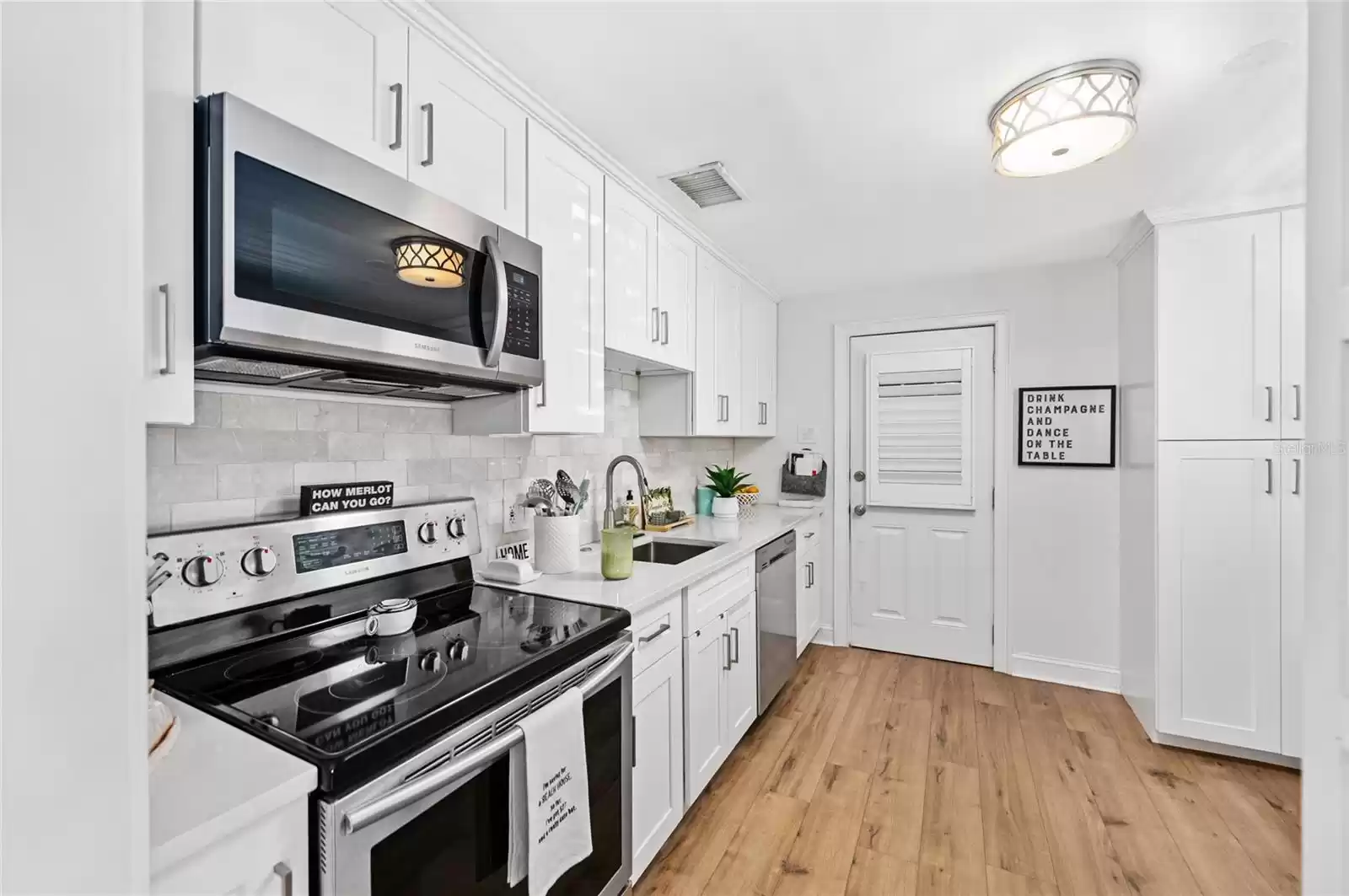 Renovated kitchen with built in pantry.