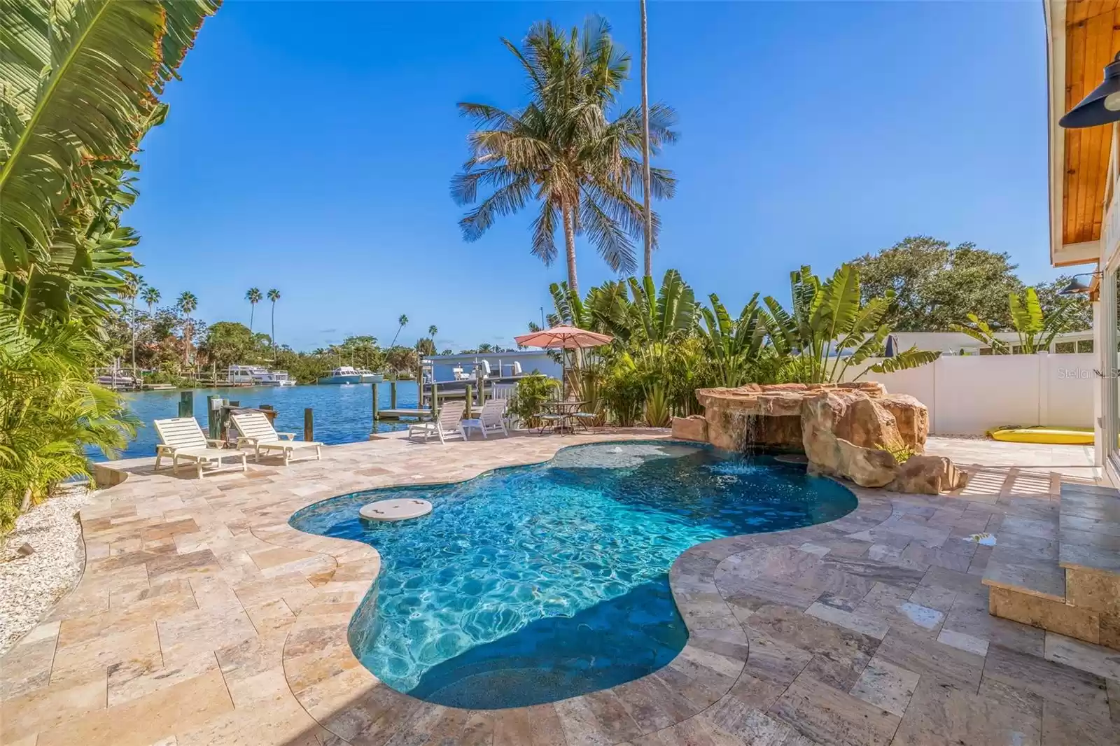 Large Pool with waterfront views