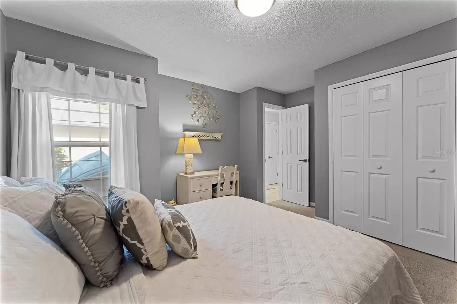 Bedroom with built in closet and Jack and Jill Bathroom. Carpeted