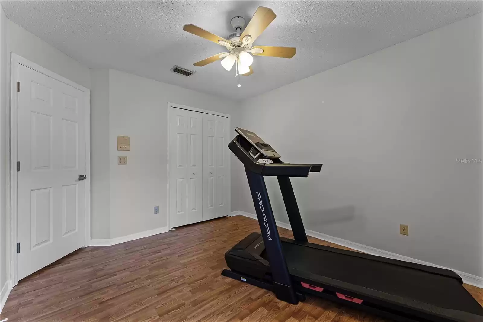 Bedroom/Office/Workout room.  Built in closet & Laminate Flooring.