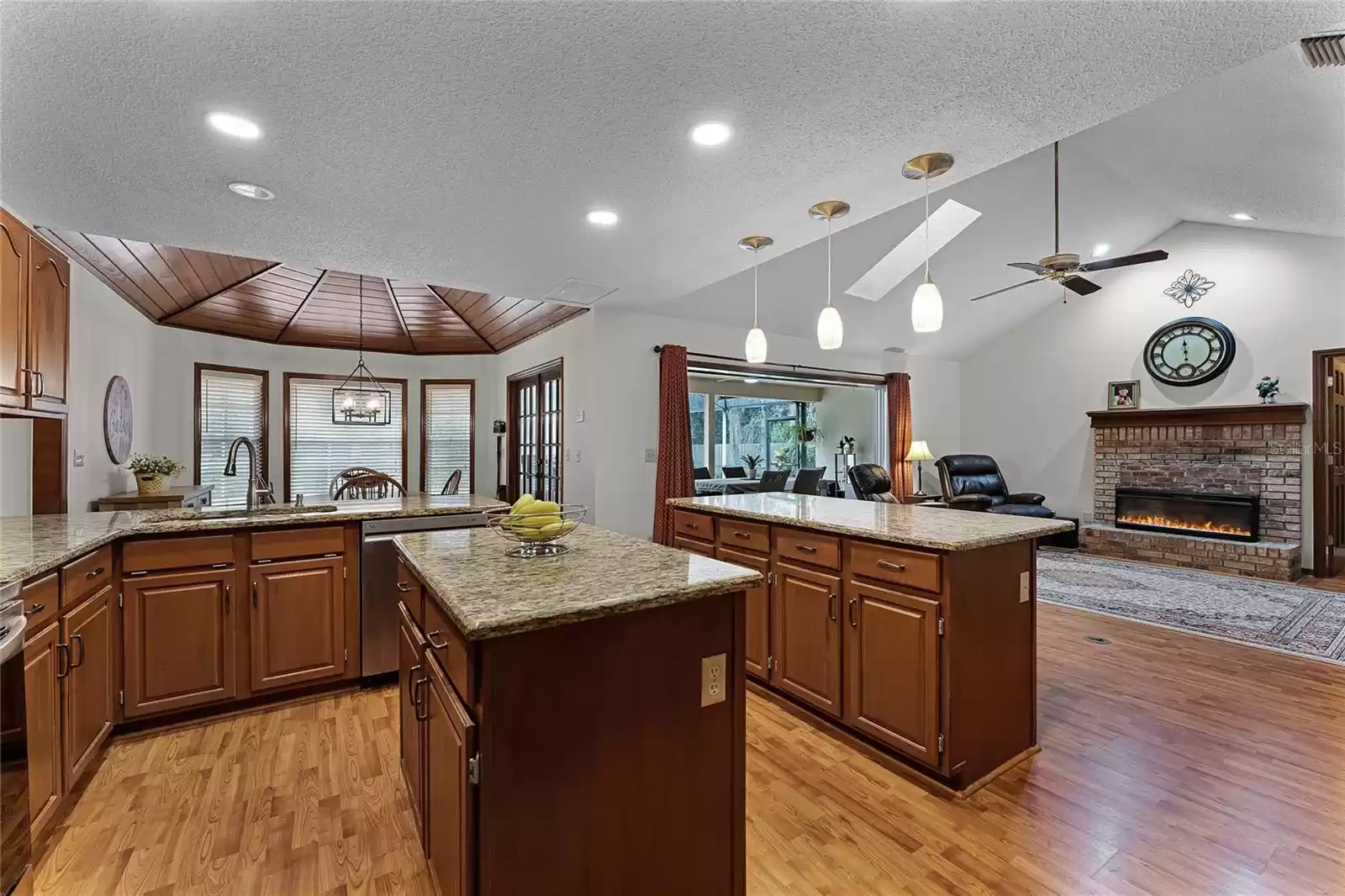 Kitchen with upgraded granite countertops and stainless steel appliances