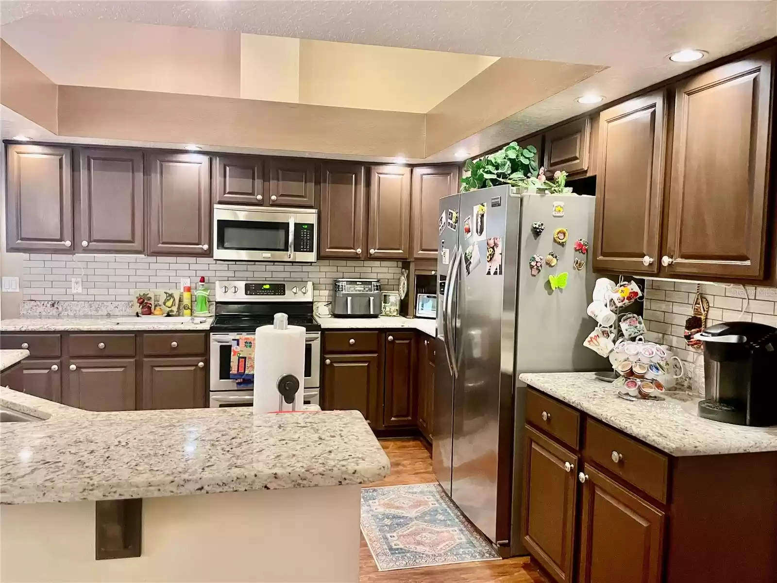 KITCHEN featuring STAINLESS STEEL APPLIANCES, DOUBLE OVEN (ONE HAS A CONVECTION MODE)