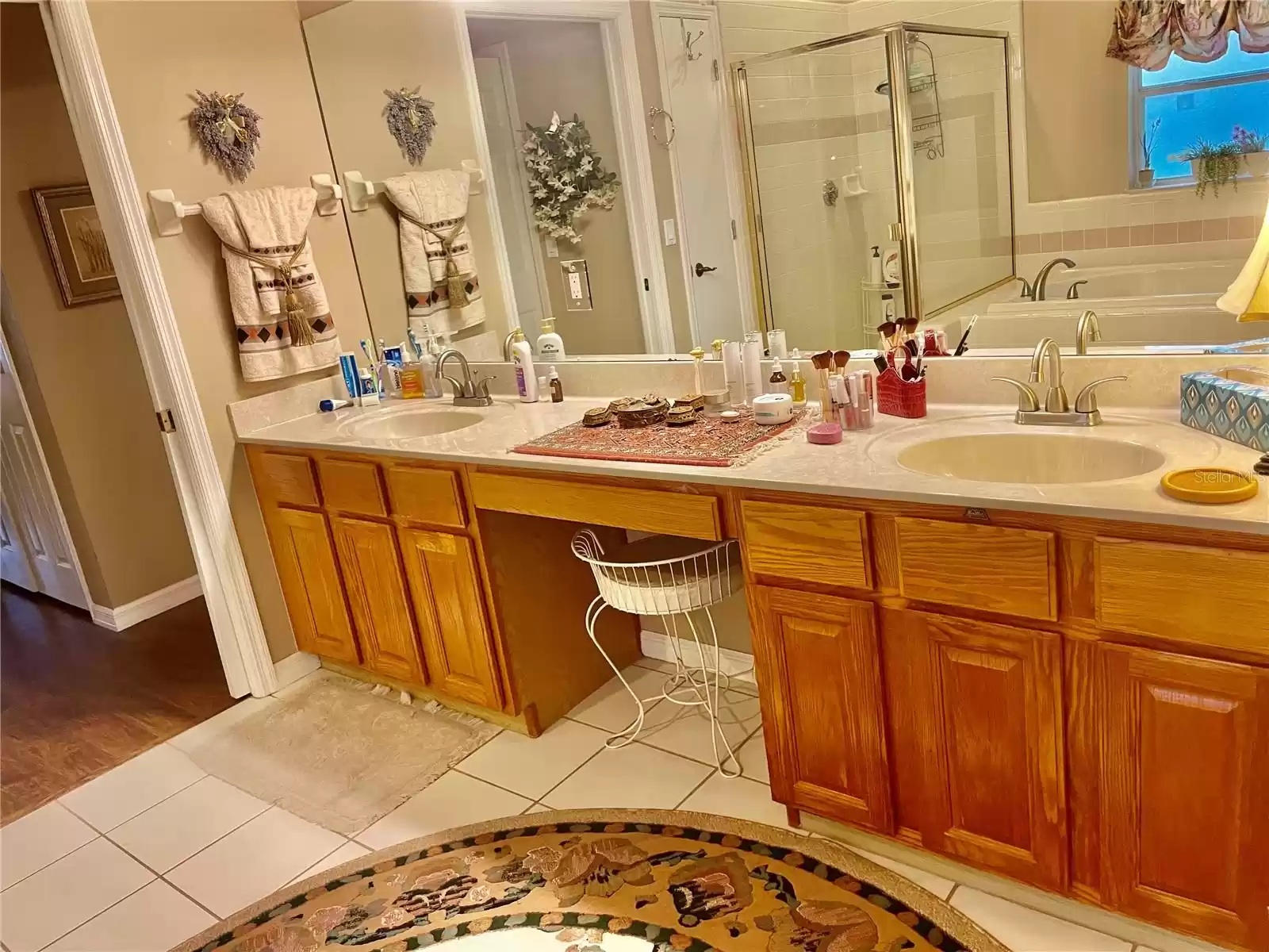 MASTER BATH featuring double vanities