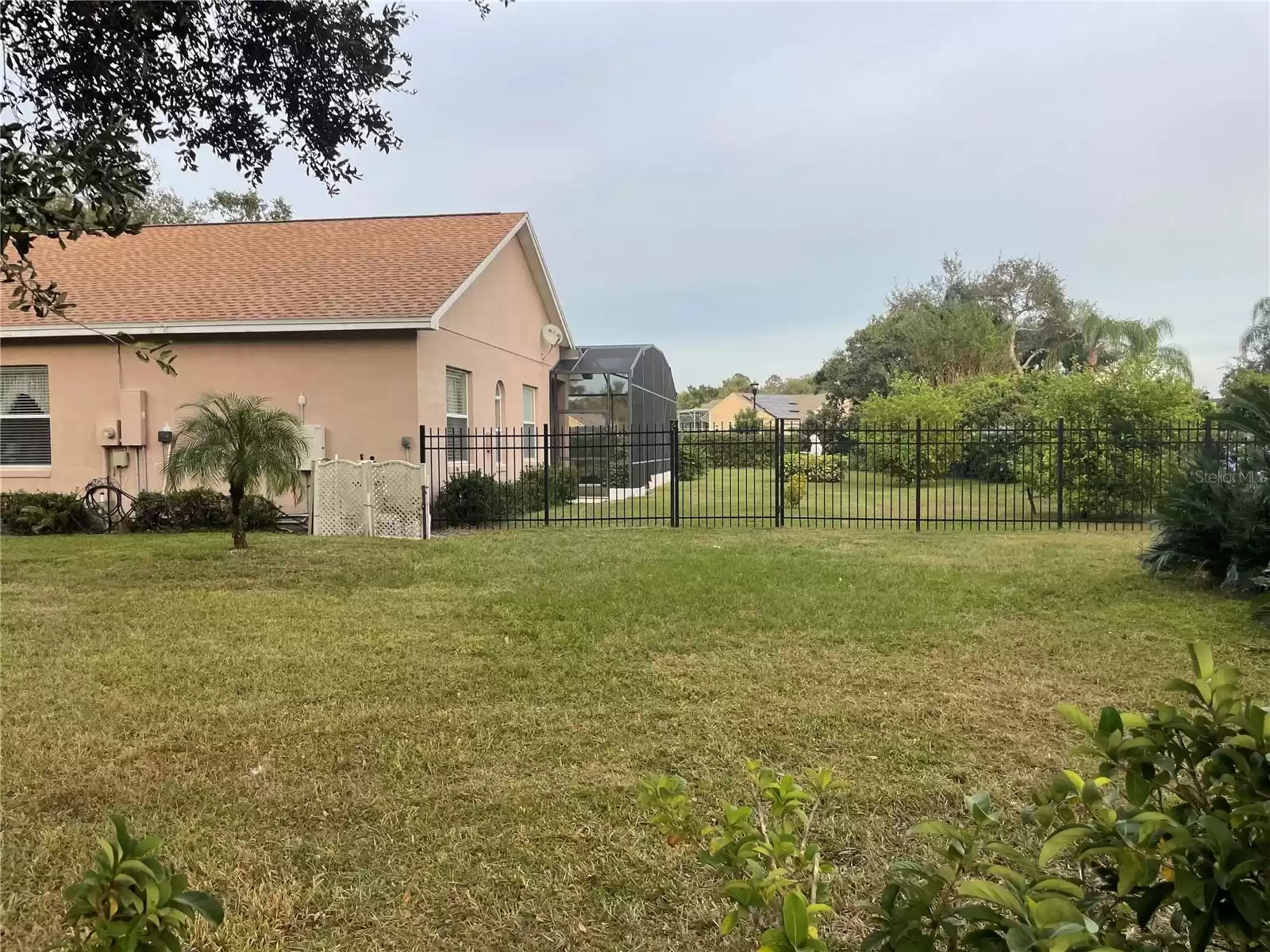 HUGE SIDE RIGHT YARD ...house sits on HALF AN ACRE!!!