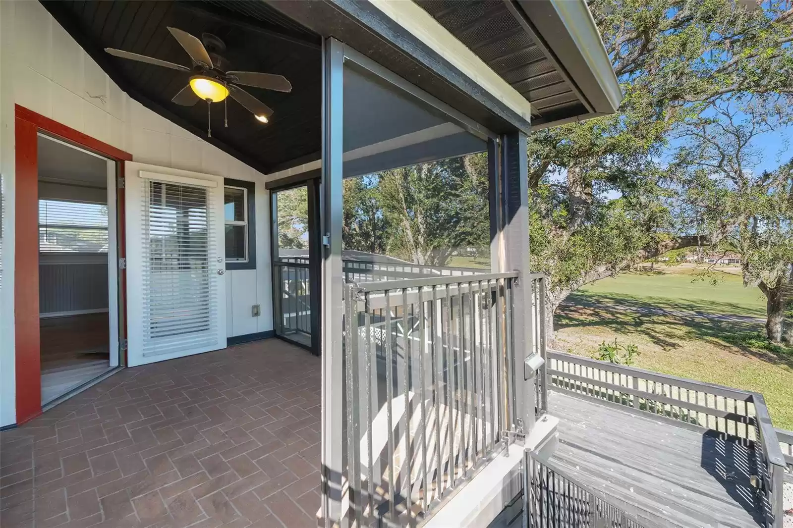 Primary bedroom balcony has stairs down to pool area.