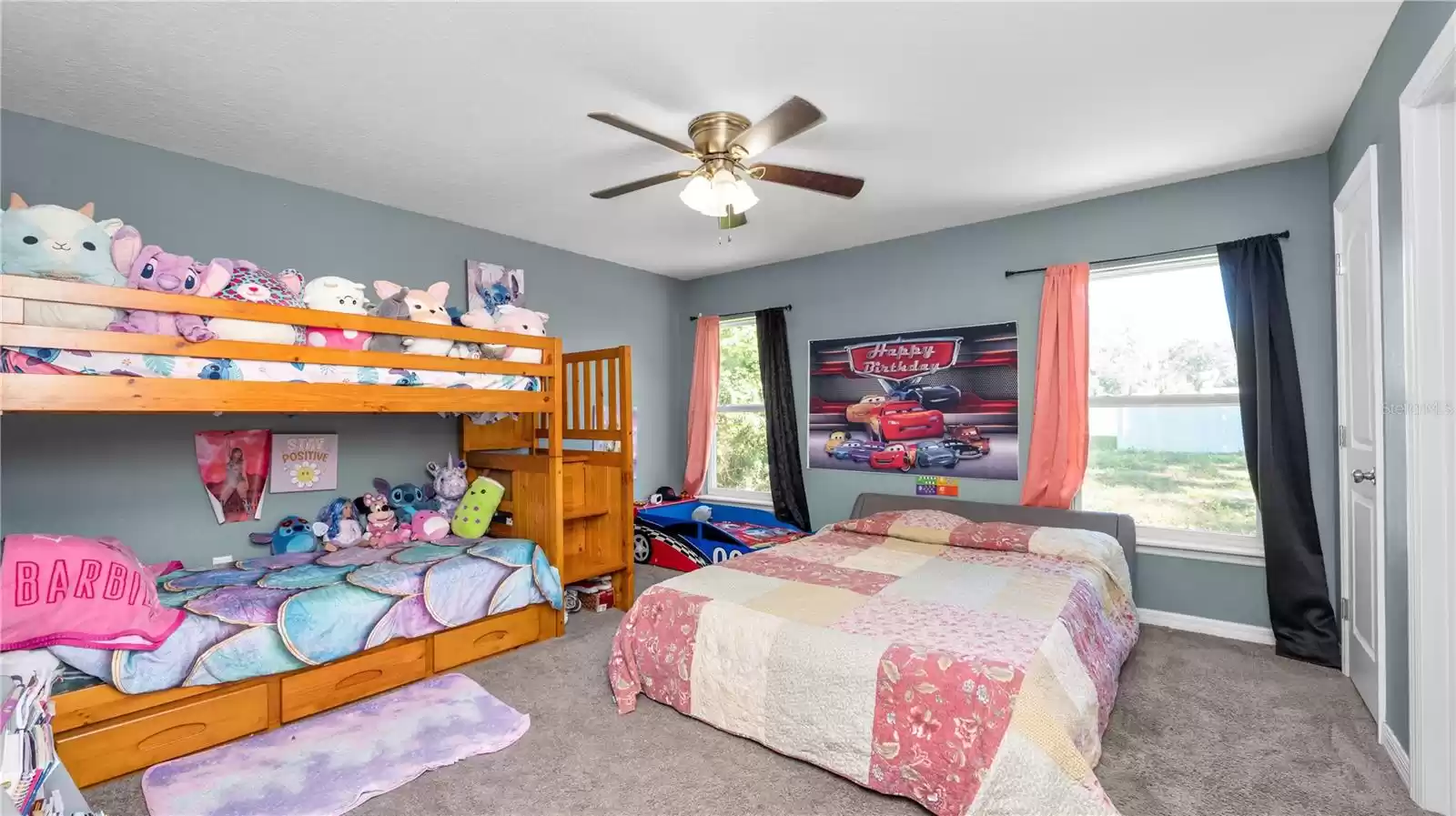 This is the master bedroom, which is currently being used as a shared space for the kids, as it's the largest room in the house.