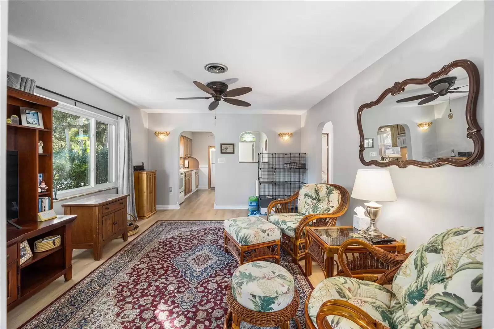 Living Room with Arched Entry Doors