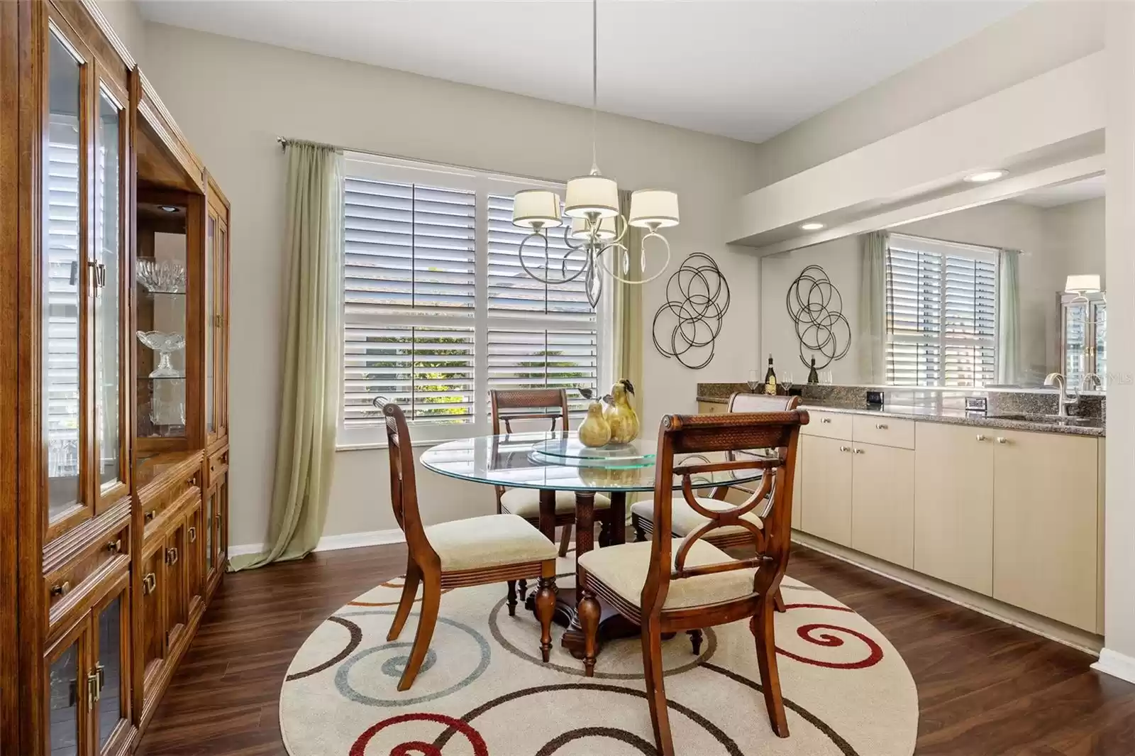 The dining room is complete with a wet bar, perfect for entertainment!