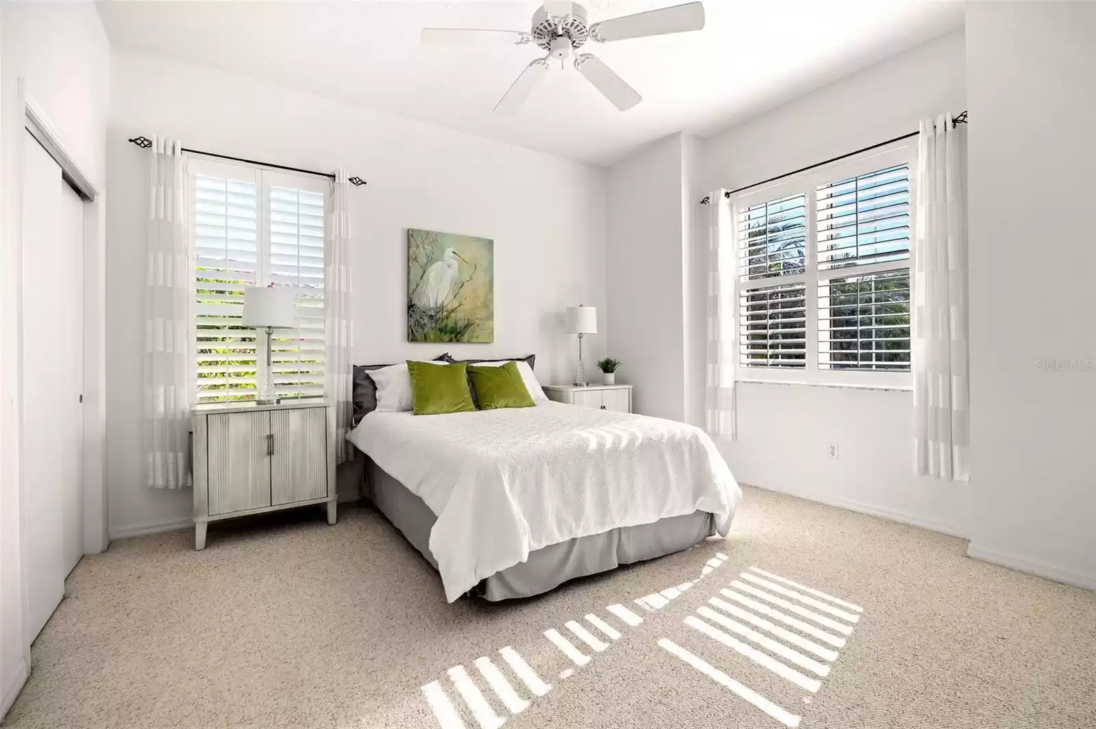 The cozy front bedroom is the only carpeted room and features direct access to a hall bath.