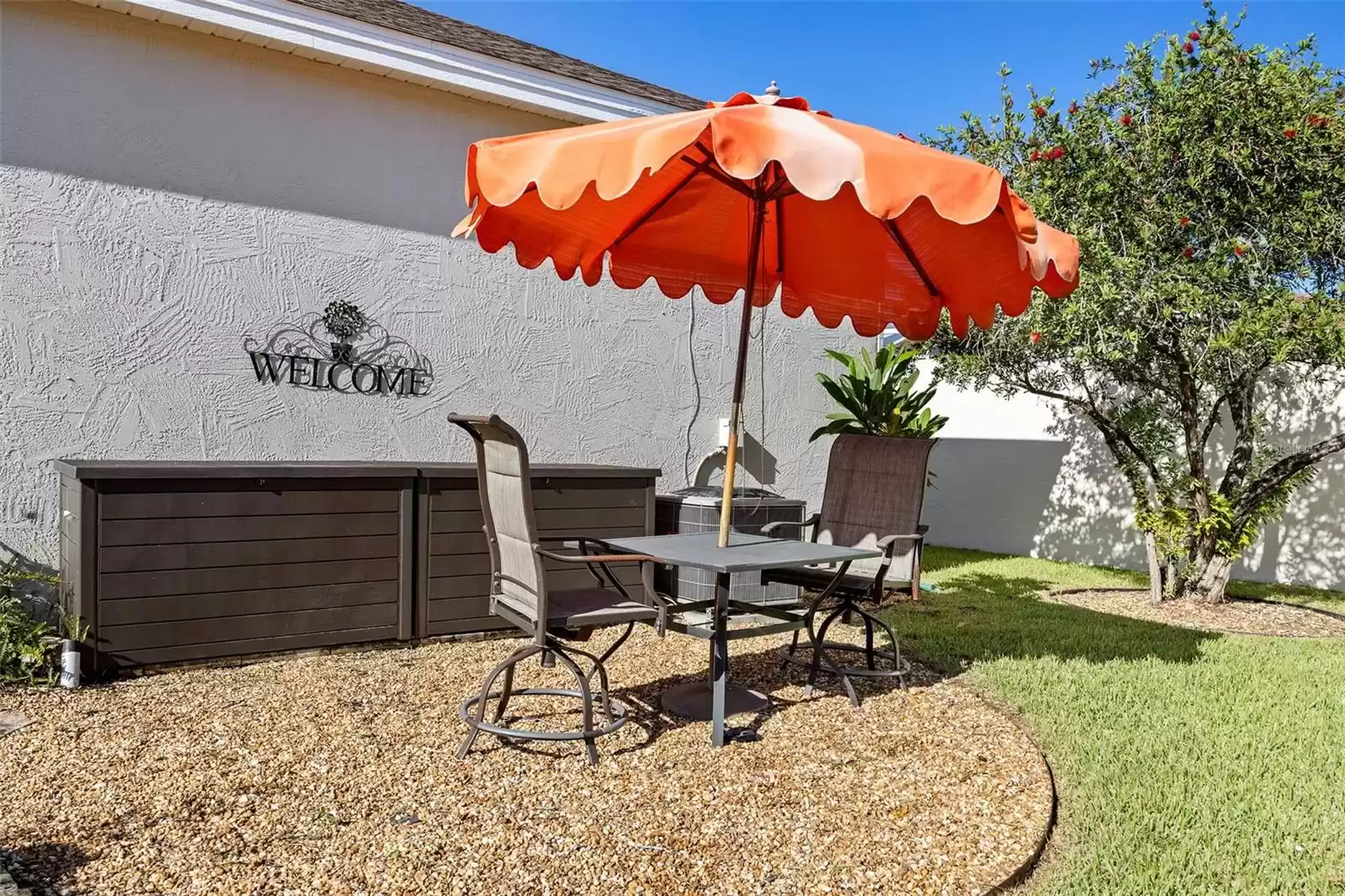 Cozy seating area can be found on the side of the home!