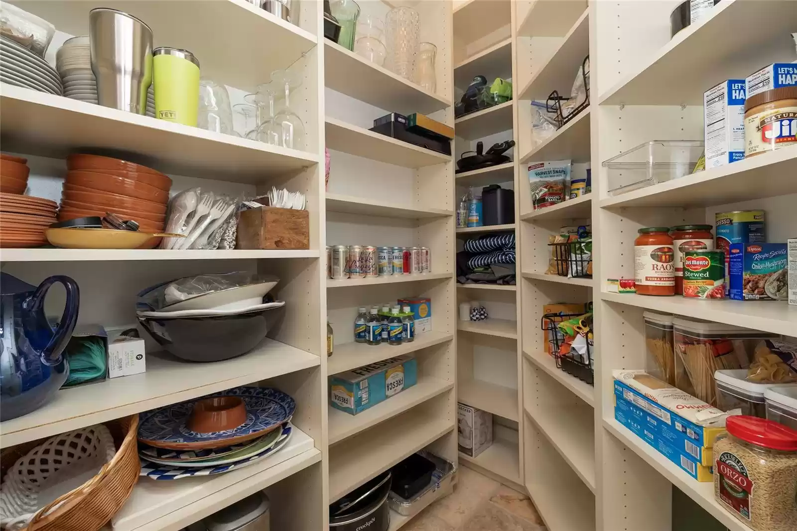 Walk-in pantry across from Butler's Pantry.