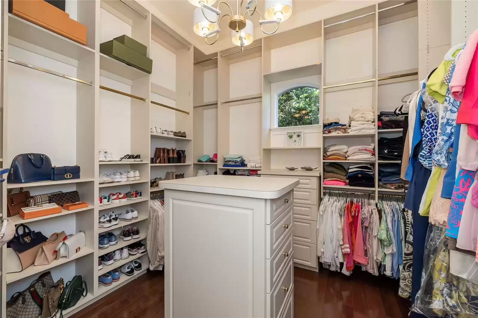 One of two walk-in closets in the primary suite.