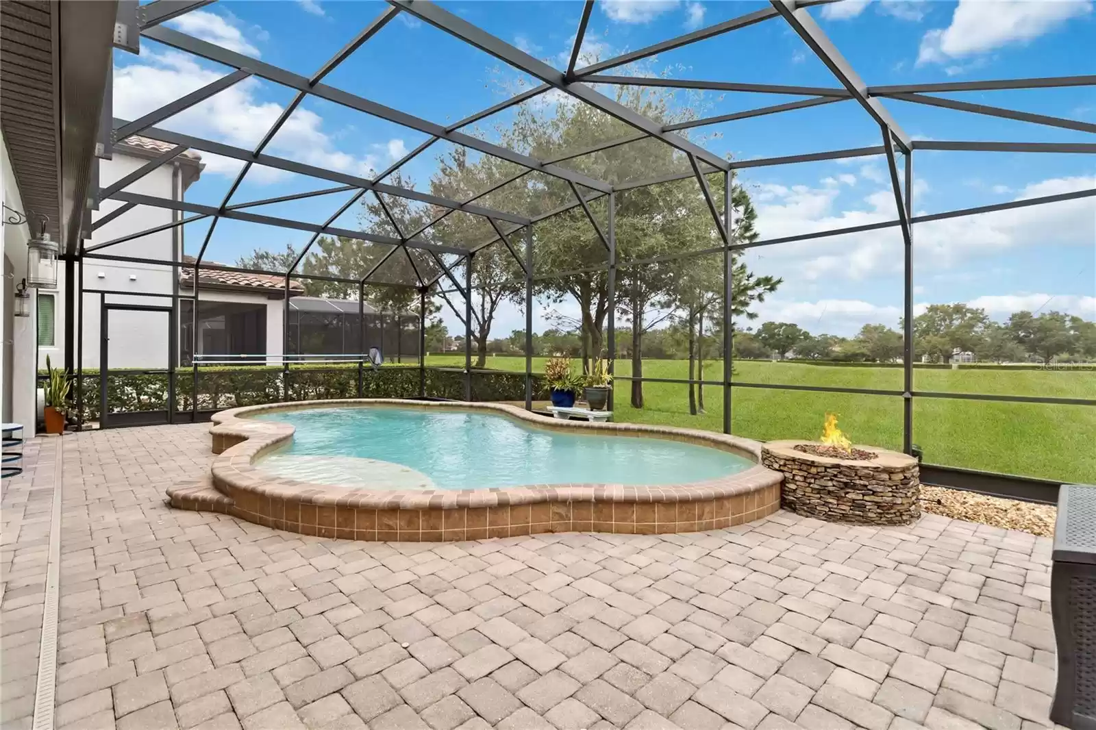 Enclosed Pool/Backyard