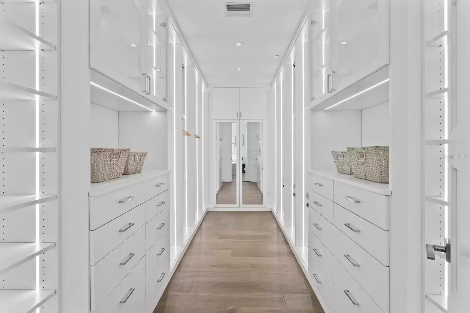 Enormous Main Bedroom custom closet.